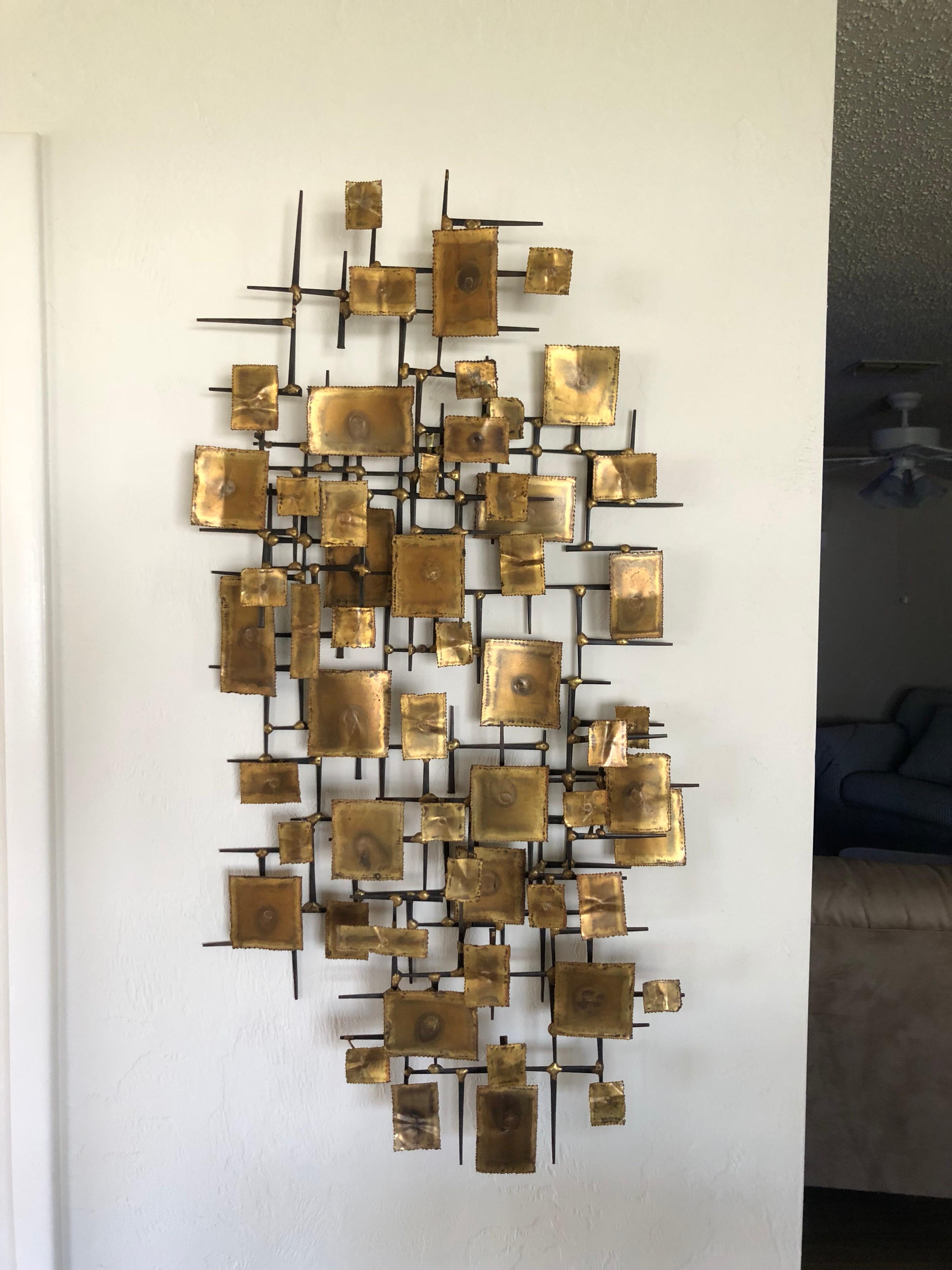 Mid-Century Modern brutalist wall sculpture . Amazing patina and depth to this sculptural piece of nail wall art. We are unable to find a signature but it is similar to the styles of Curtis Jere , Marc Weinstein and William Bowie. This piece can be