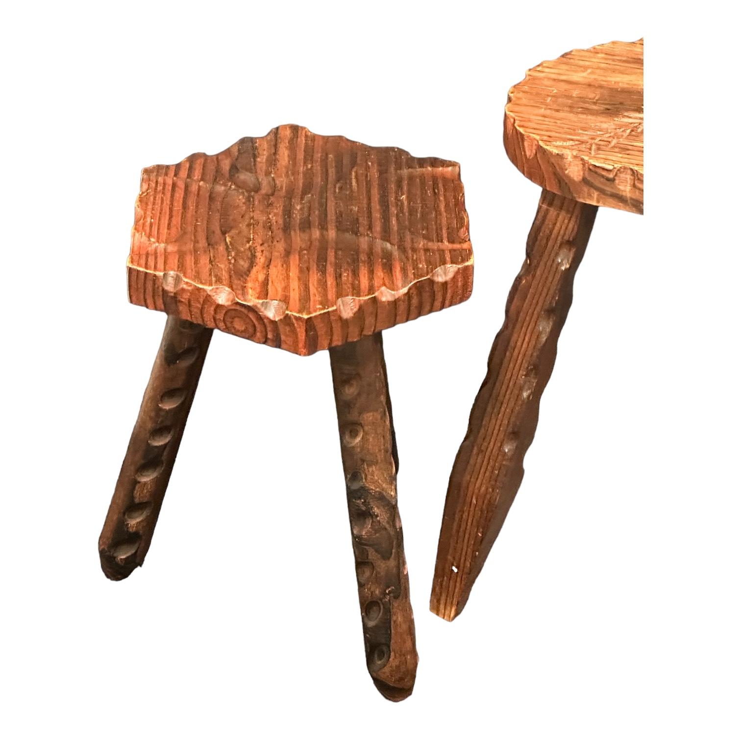 A interesting brutalist wood tripod chair from Germany, with a matching foot rest or table. Great piece of functional sculpture. Stool and foot rest is in great vintage condition and is structurally sound. Nice addition to your room, entry hall or
