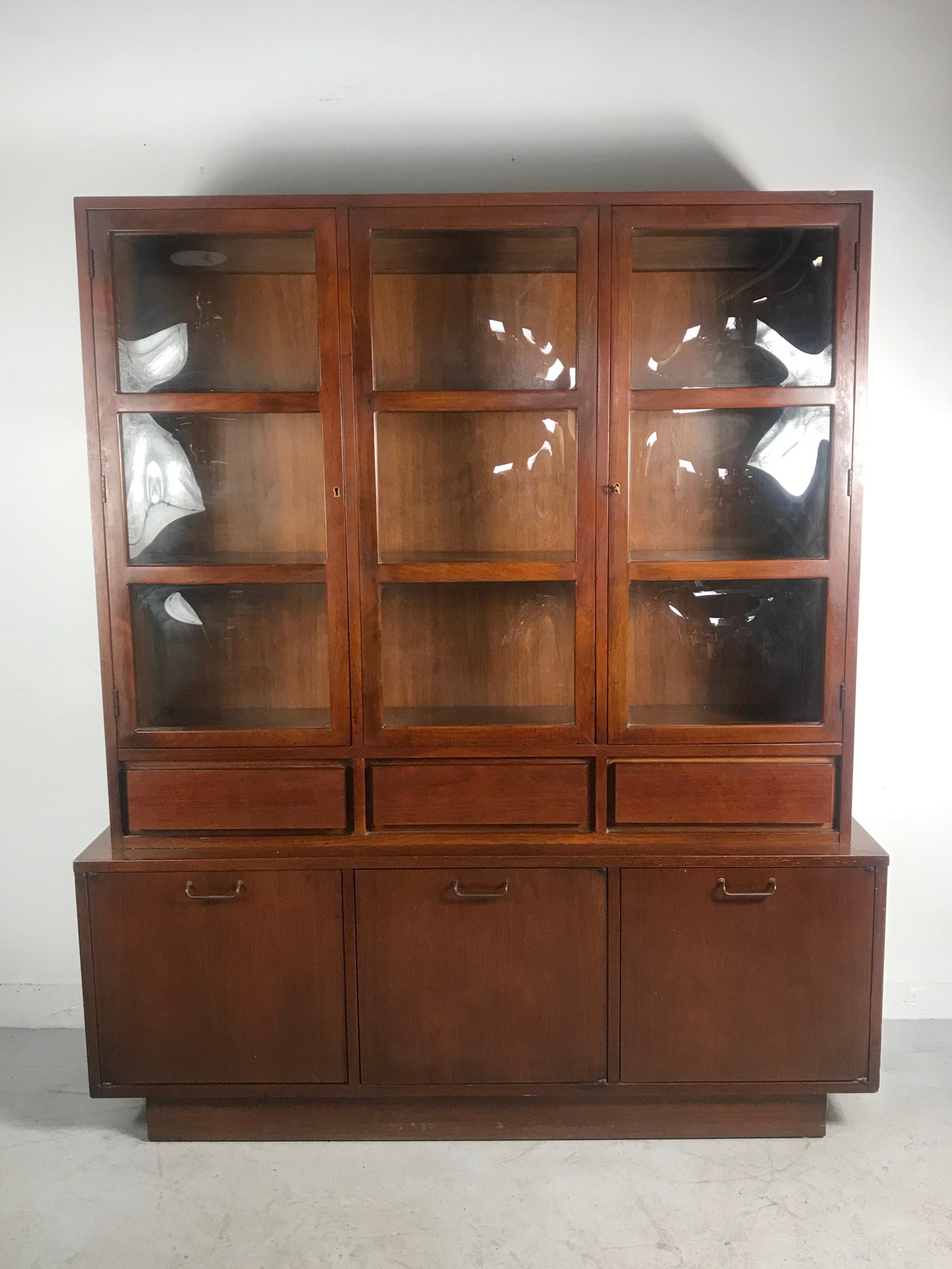 Seldom seen modernist server with stunning Bubble glass top designed by Merton Gershun for American of Martinsville. Featuring three generous storage to bottom, three drawers, one being silverware drawer and two door top display locking cabinet with