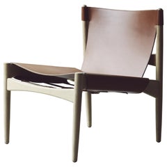 Mid-Century modern Buck Leather Lounge Chair by Erik Buck. New edition