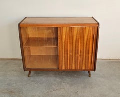 Mid Century Modern Buffet or Vitrine done in walnut, with two compartments