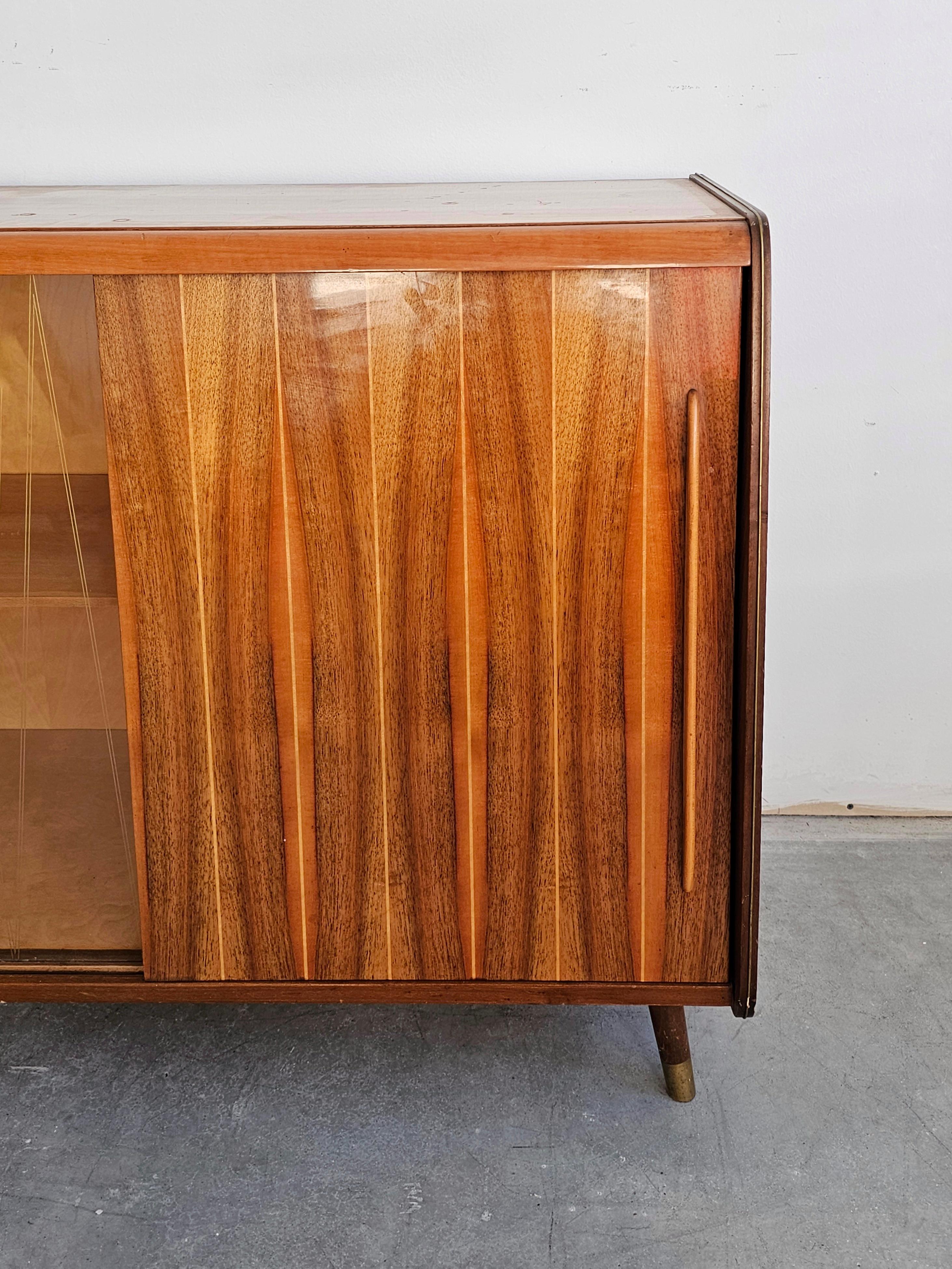 Mid-20th Century Mid Century Modern Buffet or Vitrine done in walnut, with two compartments For Sale