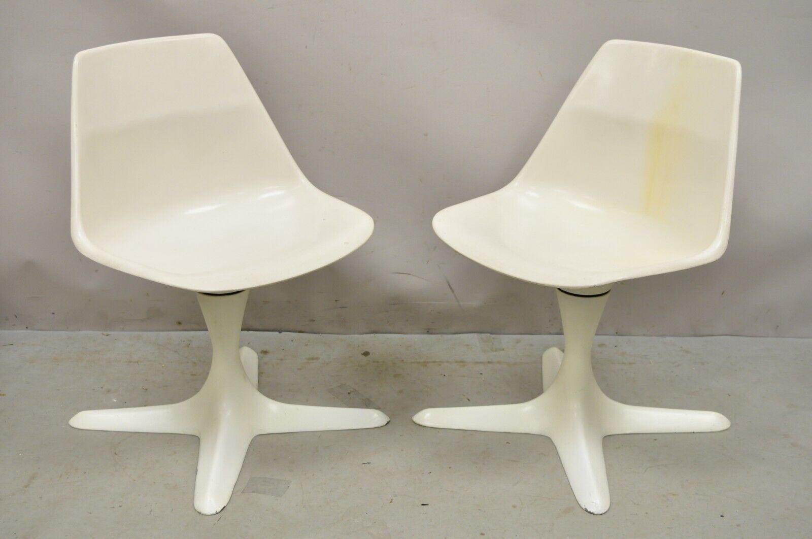Mid Century Modern Burke Style Propeller Base Small White Swivel Chairs - a Pair. Item features is a unique small size, swivel & return seat, propeller pedestal base, very nice vintage pair, great style and form. Circa Mid 20th Century.