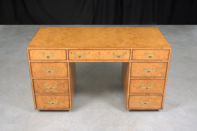 This extraordinary Widdicomb executive desk is beautifully hand-crafted out of wood and exotic veneers in great condition and has been completely restored stripped and newly refinished by our professional craftsmen team in the house. This vintage