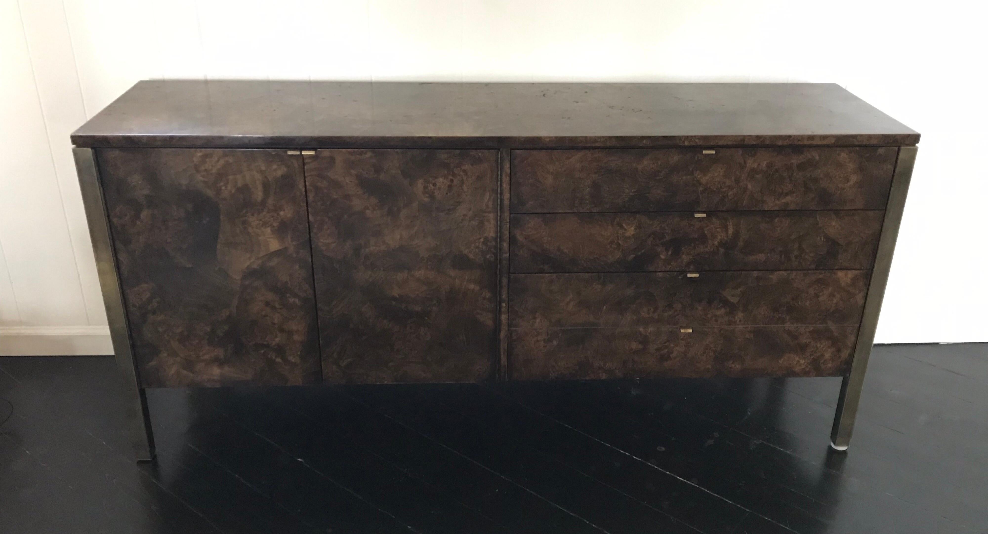 Beautiful patchwork burled walnut credenza or sideboard by Tomlinson. Rich dark mocha brown coloring. Clean lines with brass pulls and aged brass patina legs, circa 1960s.