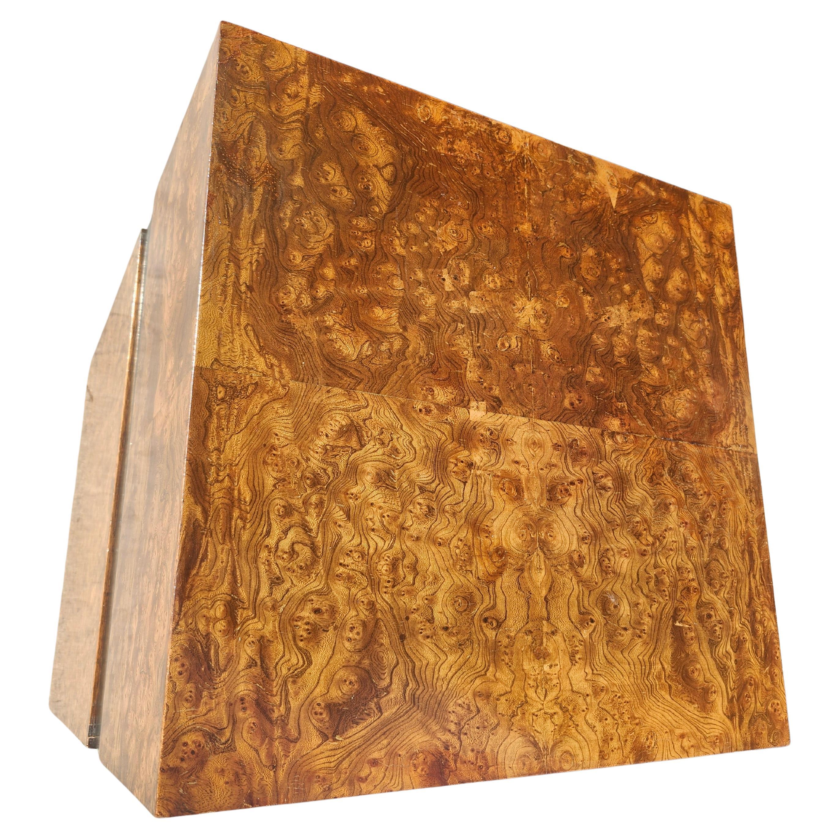 Rare and unique cube table pedestal with a pull out work desktop that completely disappears when closed. Covered in a olivewood burl with a black band that completely navigates the table and adds a decorative feature alo g with bei g the pullout