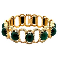 Bracciale d'oro e malachite con cabochon della metà del secolo scorso