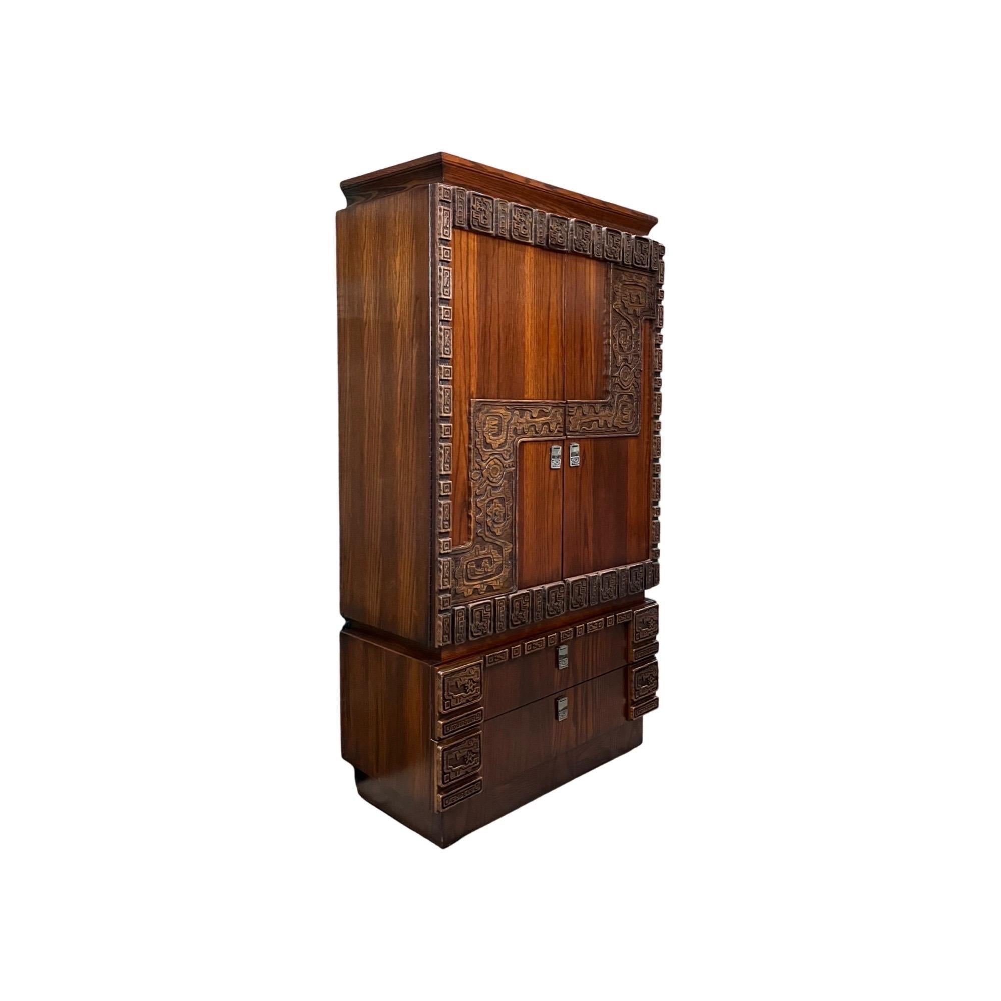 Canadian Brutalist Mid-Century Modern Mayan Style oak Armoire. A one of a kind Grand Armoire makes a statement in any room and provides ample storage at the same time. Detailed patterns throughout the Armiore feature intricate Mayan style carvings