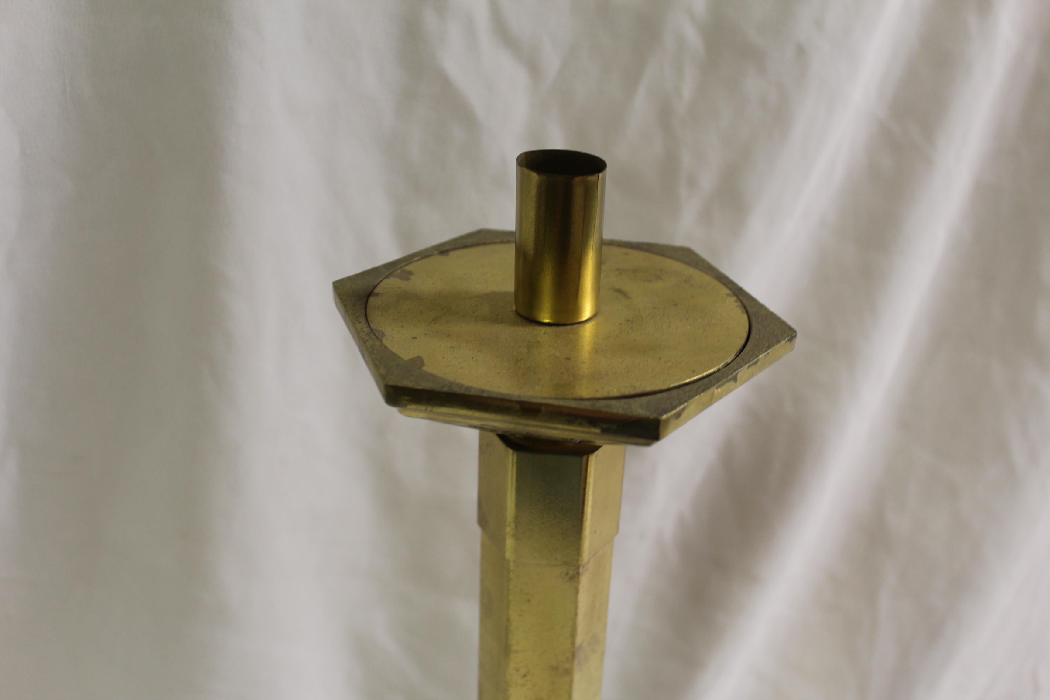 Maybe Deco /Modern designed candle stick. Polished brass finish. total Height is at 18