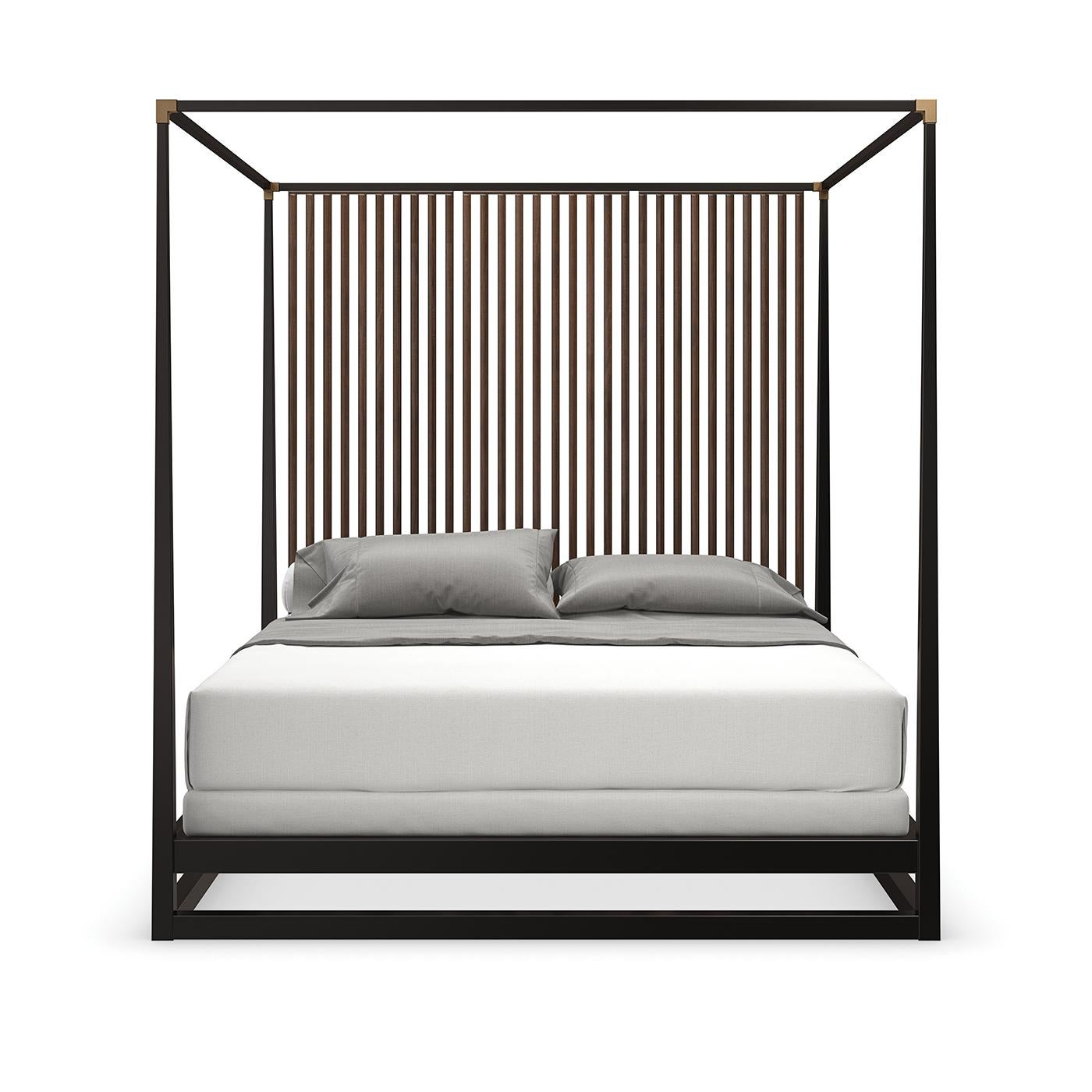A Mid-Century Modern style canopy bed with a dramatic vertical slat back design. It has an architecturally inspired design that features Rich Walnut vertical slats, warmly contrasted by a dark chocolate canopy and posts accented with champagne gold