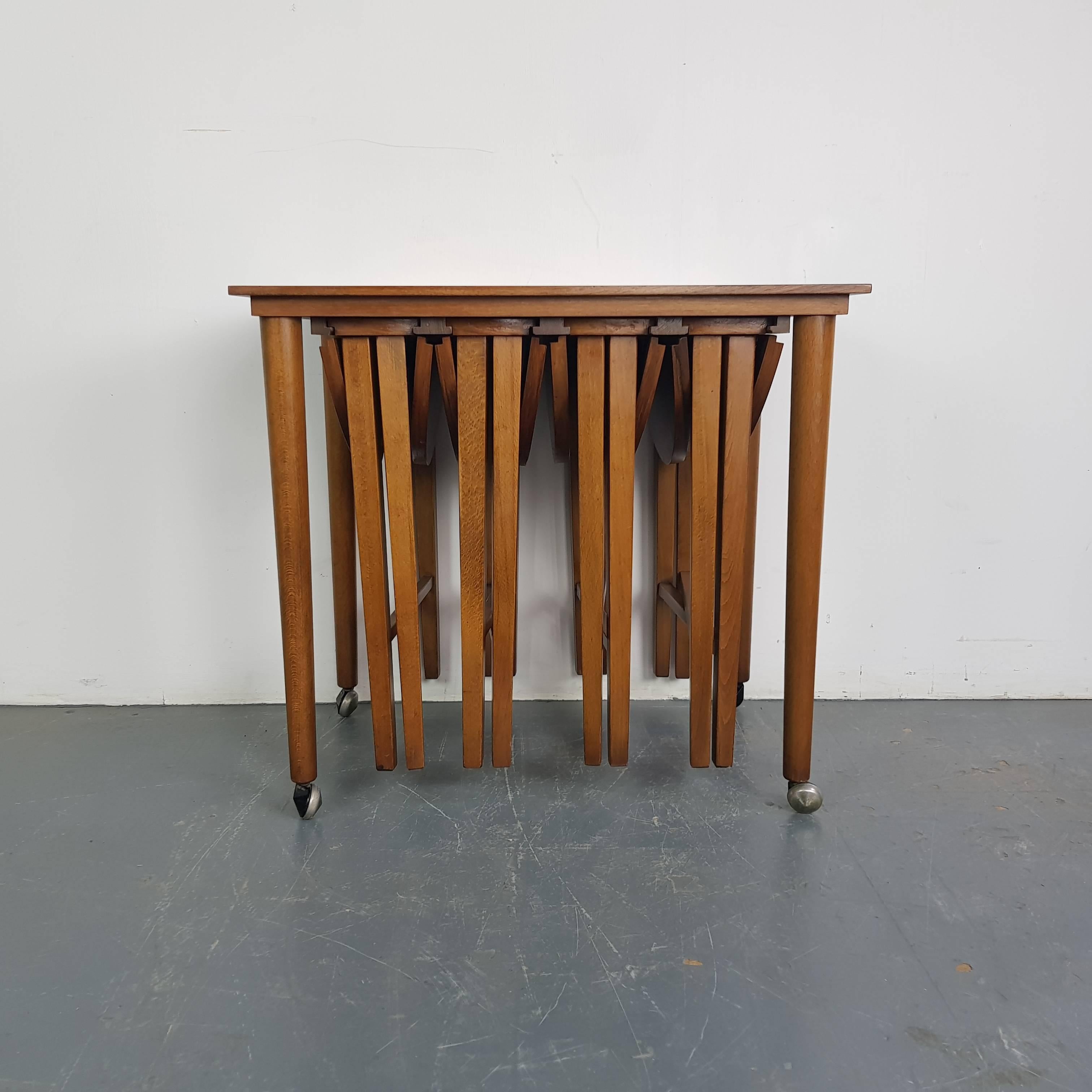 English Mid-Century Modern Carlo Jensen Style Nesting Table Set For Sale