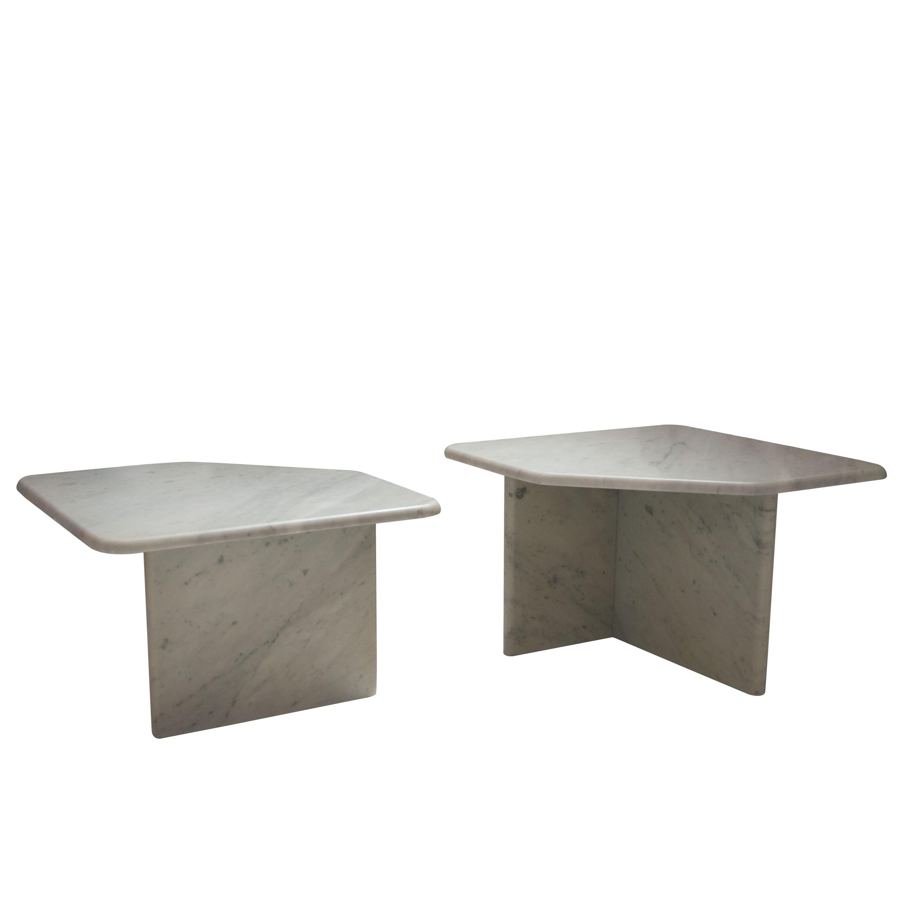 Mid-Century Modern Italian Carrara marble center table. Composed of two pieces in different heights with foot and table made of solid marble.
 