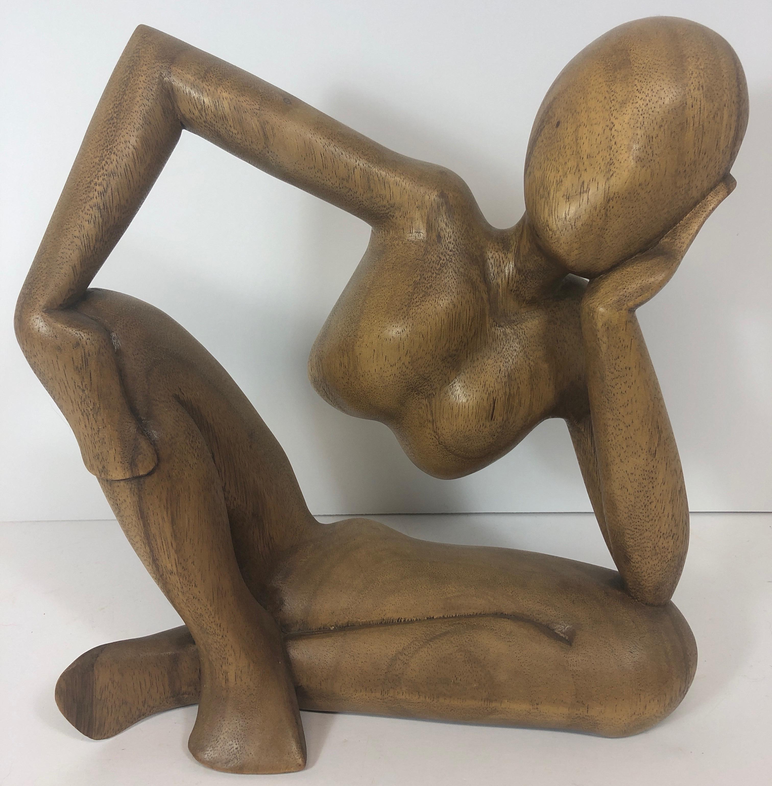 Mid-Century Modern carved wood abstract nude male sculpture. Nice condition.
