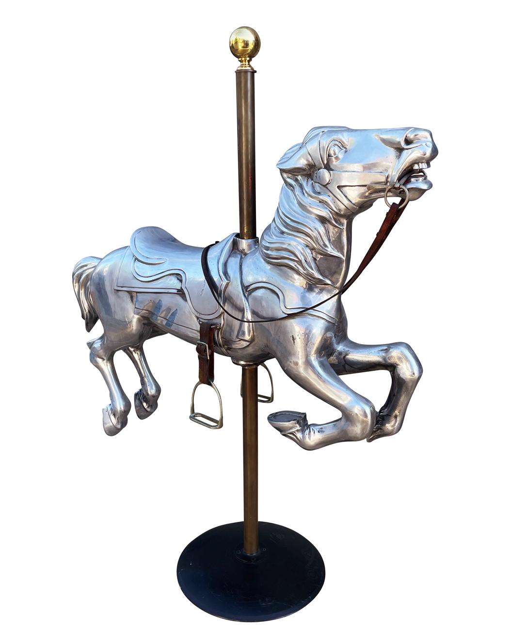 A mid century streamline design carousel horse in cast aluminum. The original paint was removed 40+ years ago and its been used as a sculptural piece of art.. Last owners claim it came from the Worlds Fair.