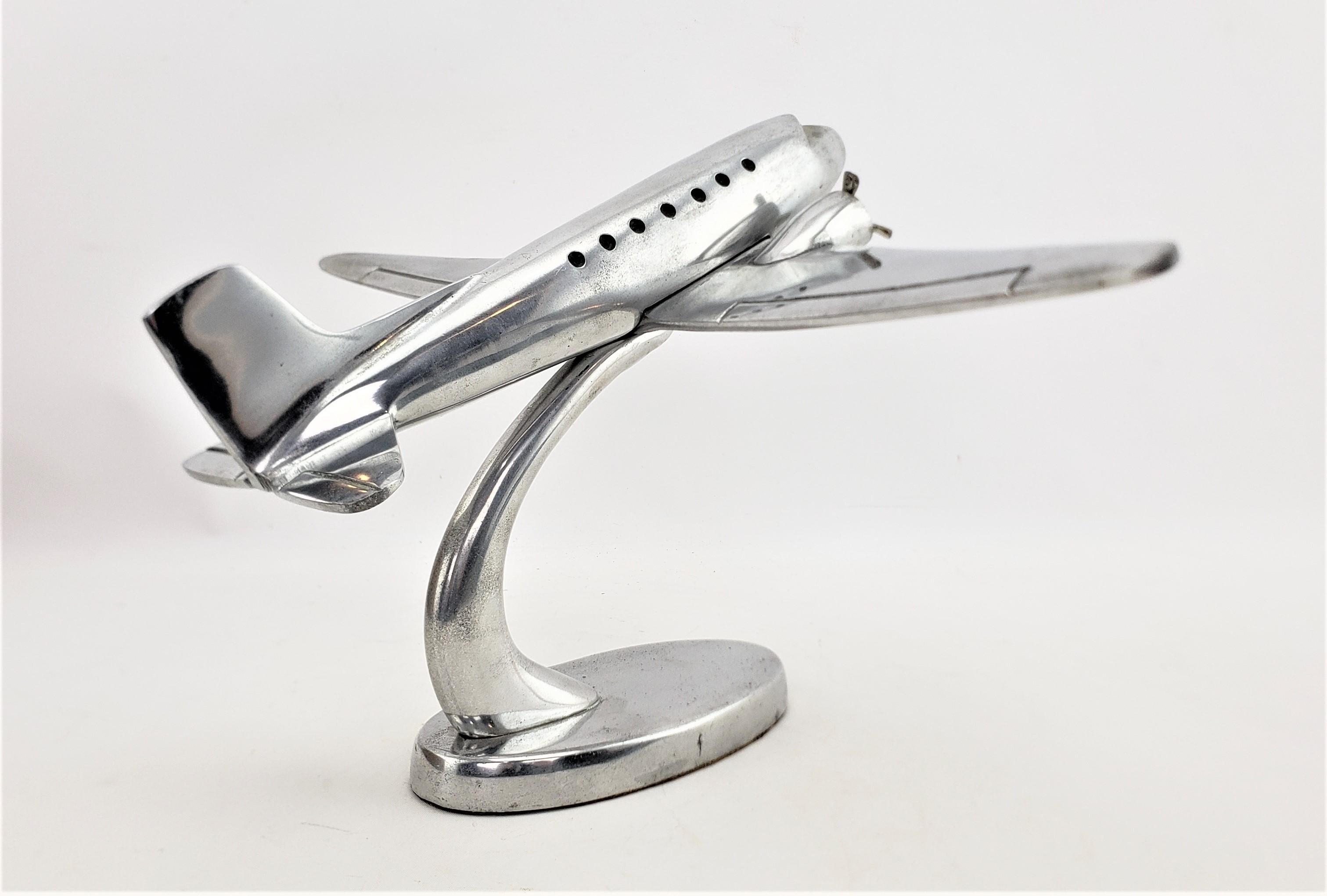 American Mid-Century Modern Cast Aluminum Stylized Airplane Model or Sculpture & Stand