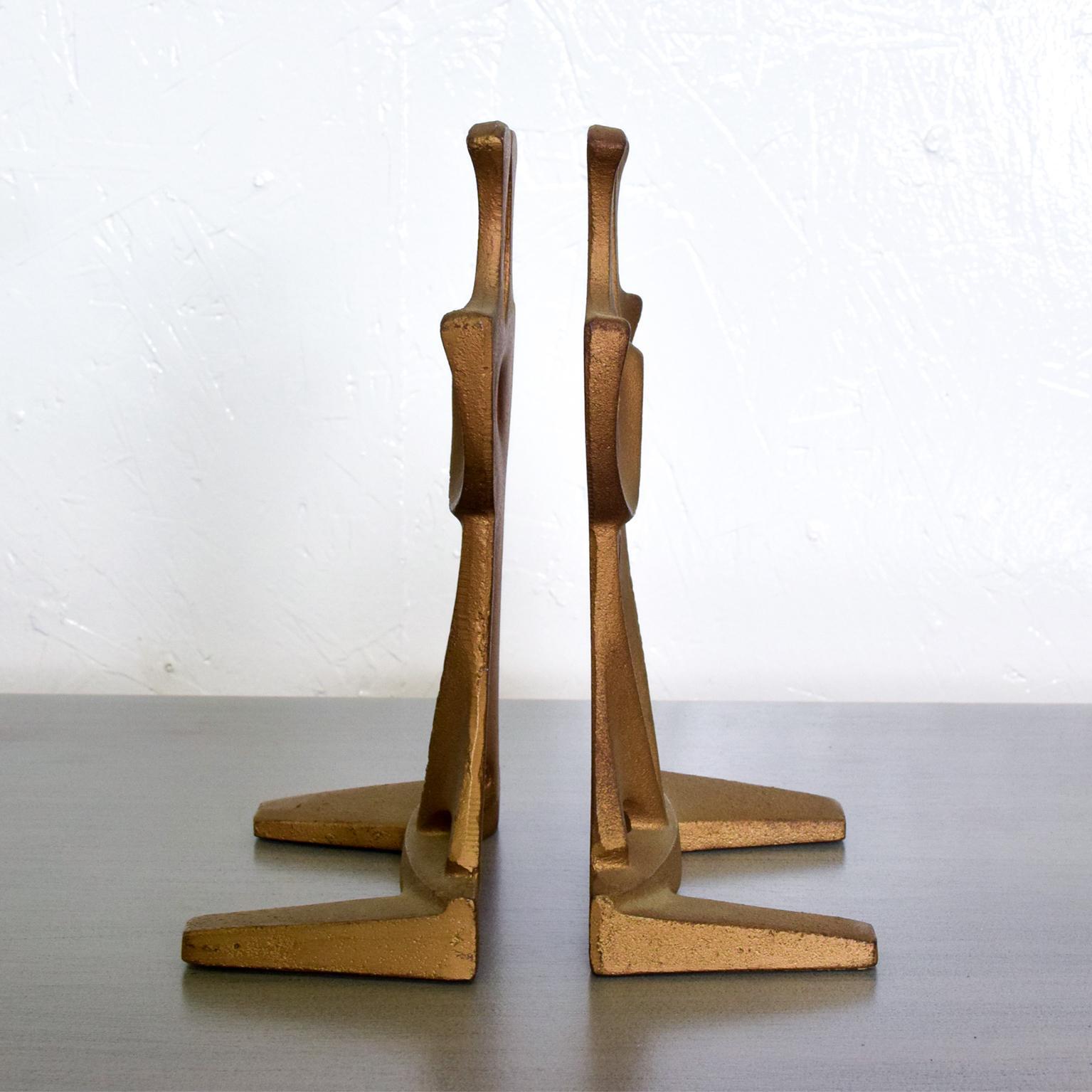 For your consideration, a Mid-Century Modern cast iron sculptural bookends. Stamped: 