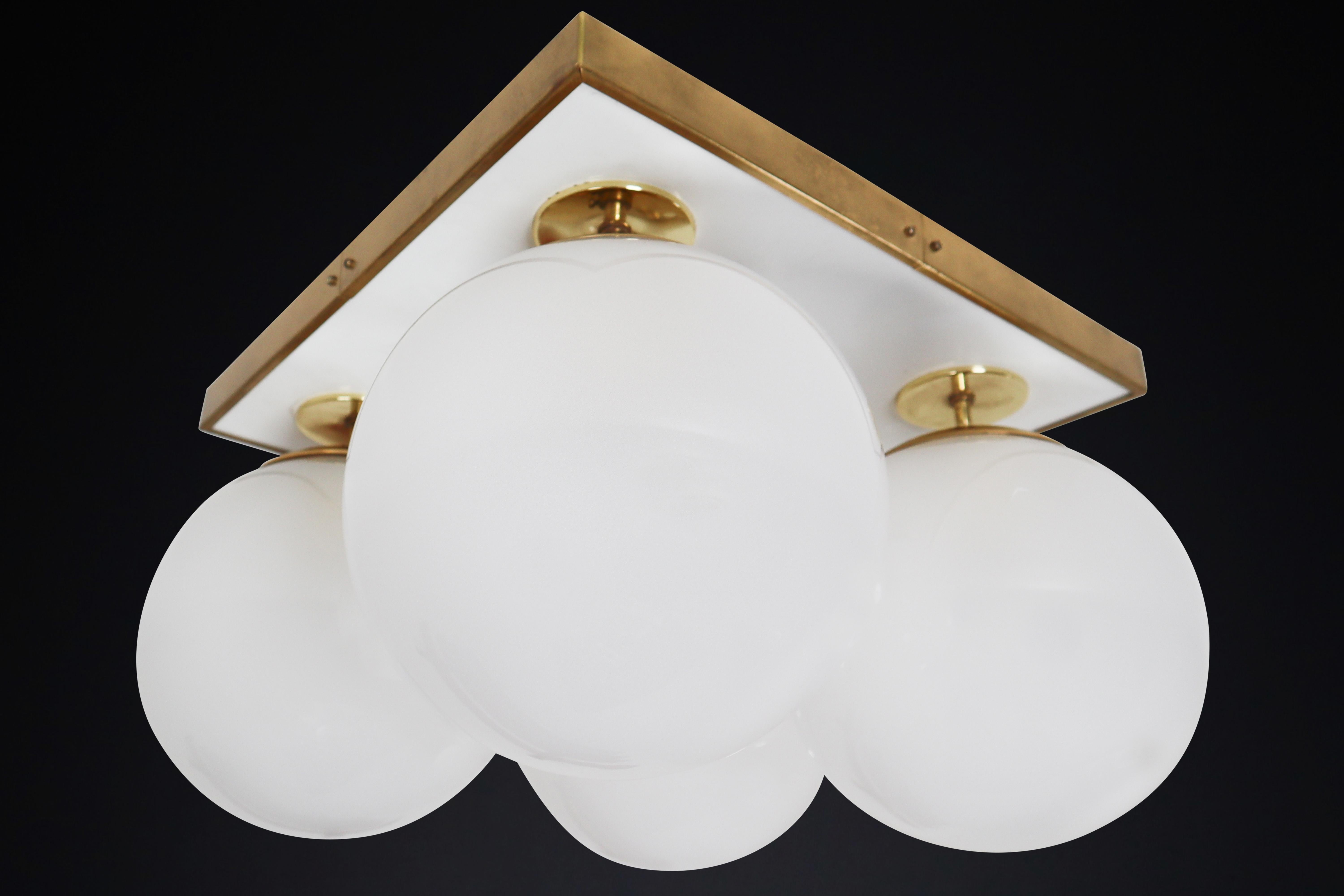 Czech Mid-Century Modern Brass Ceiling Chandeliers with Four Pearl White Glass Globes For Sale