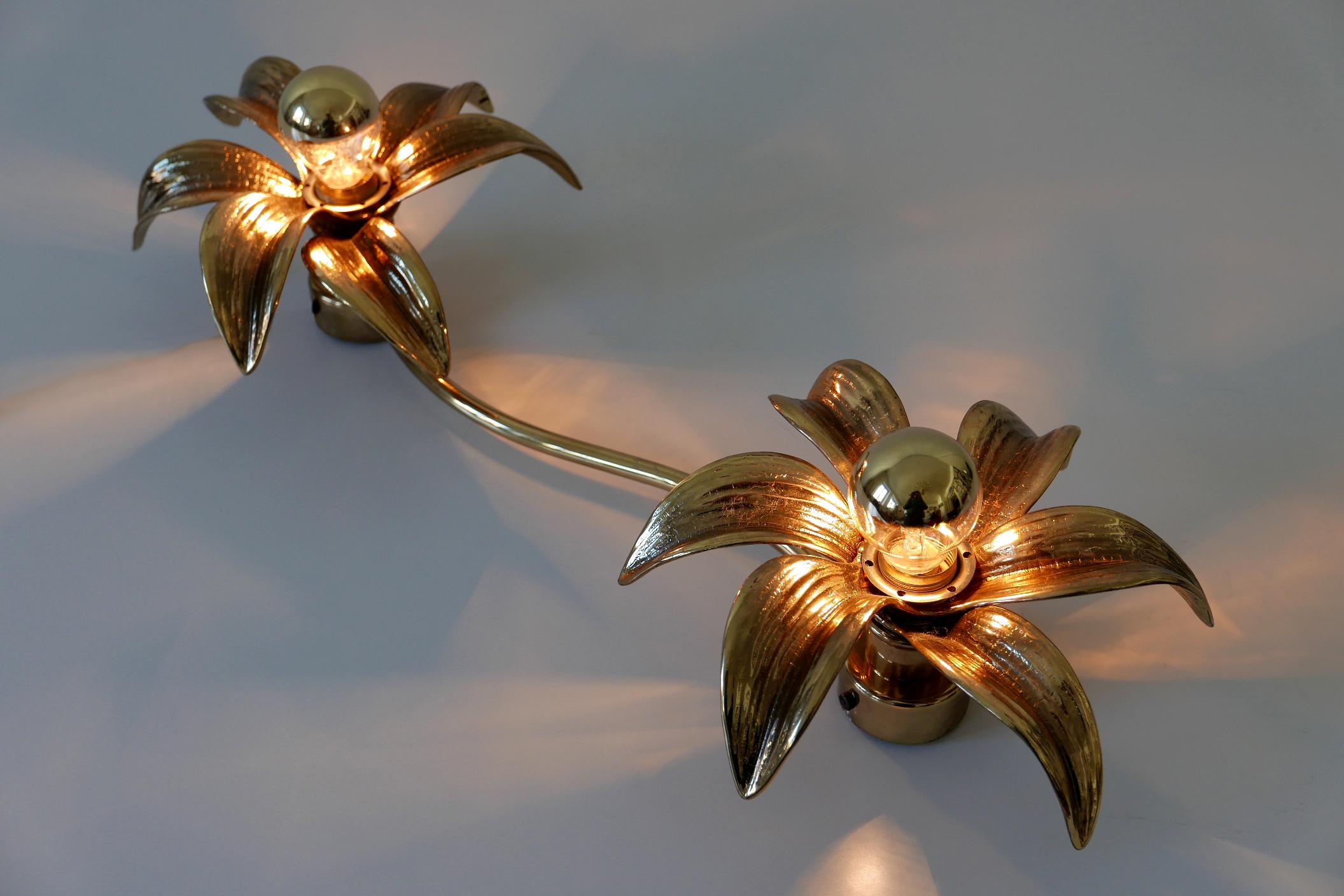 Amazing Mid-Century Modern floral two-armed brass ceiling fixture or wall lamp. Designed by Willy Daro for Massive Lighting, 1970s, Belgium. 

The lamp is executed massive cast brass and needs 2 x E14 / E12 Edison screw fit bulbs (better top