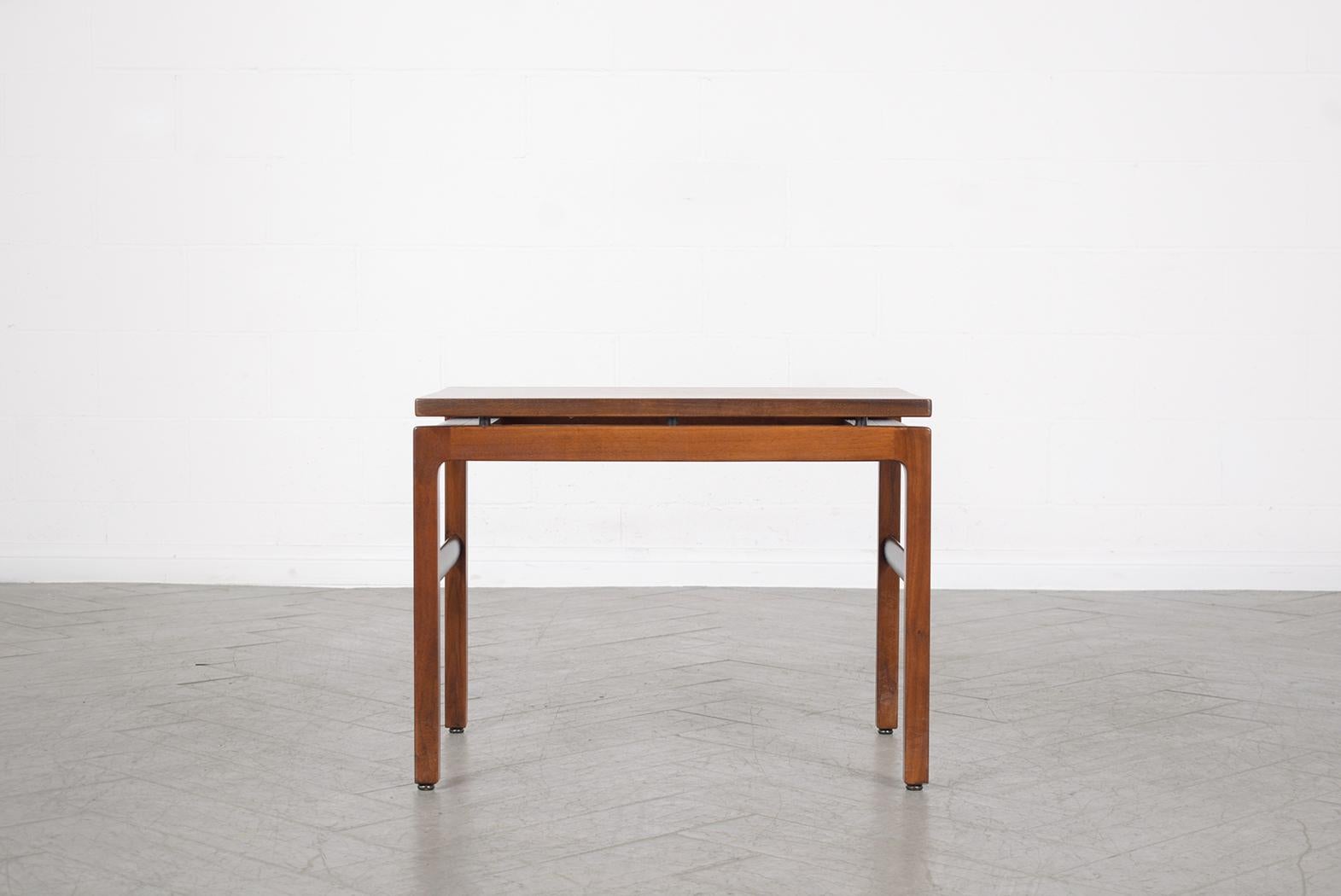 American 1960s Mid-Century Modern Walnut Side Table: Restored with Ebonized Accents For Sale