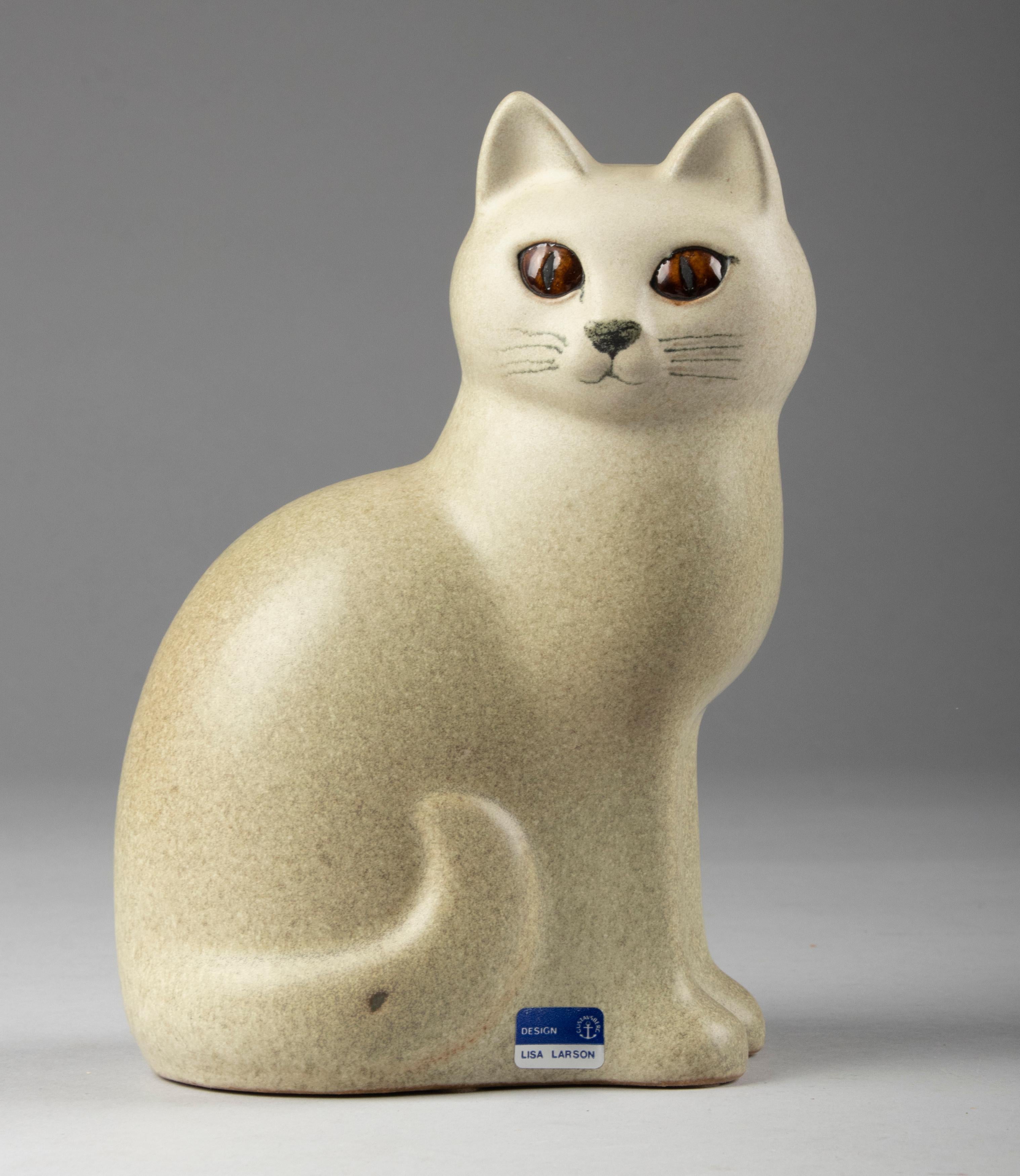 Nice ceramic statue of a cat from Lisa Larson Studio. Lisa Larson is a Swedish ceramic designer who started in Gustavsberg Porcelain Factory in 1953. She is best known for her humorous and friendly characters. This piece is in very good condition.