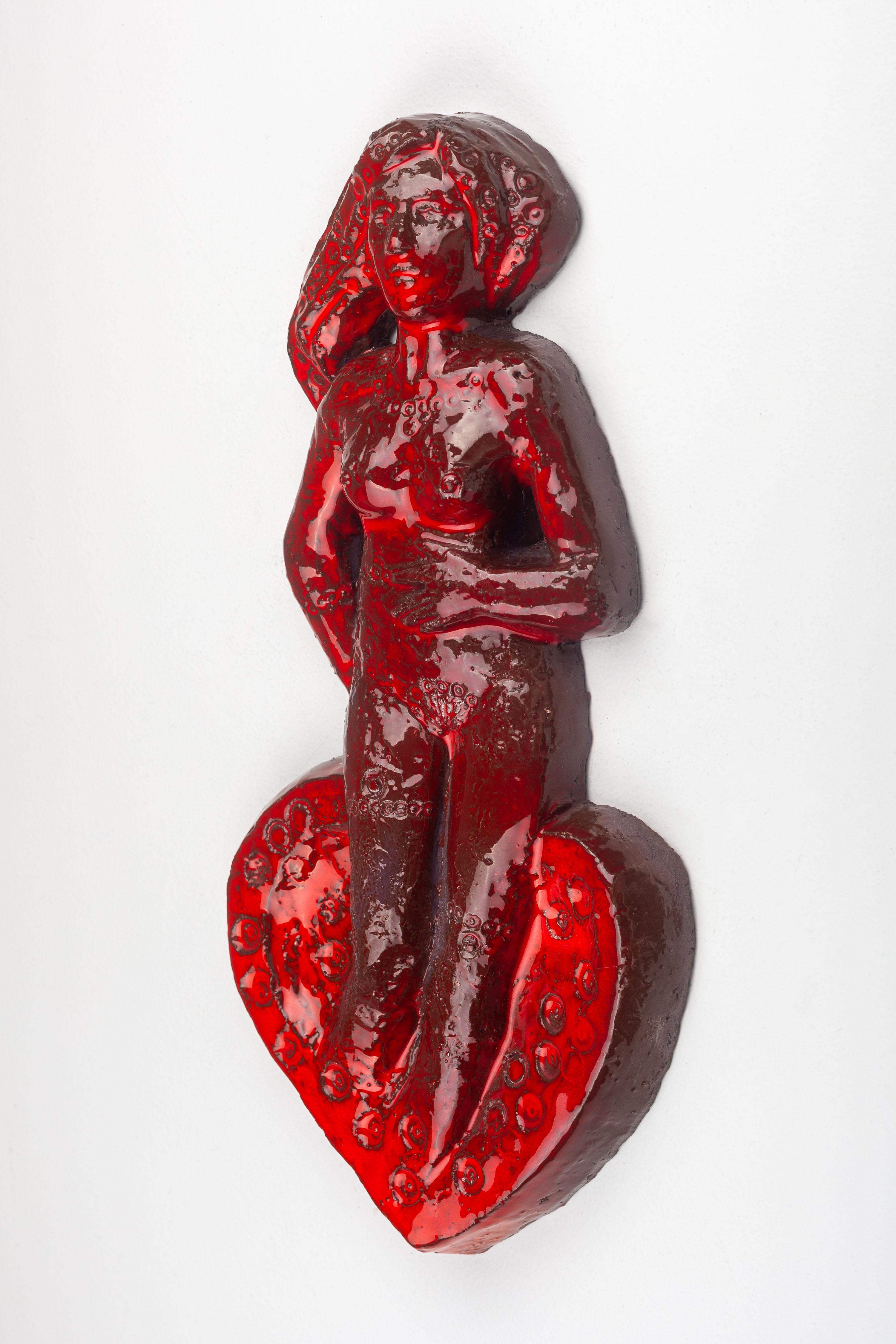 European Mid-Century Modern Ceramic Figurine on Heart, 15-Inch For Sale