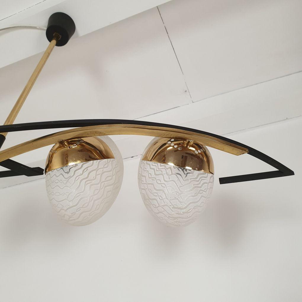 Metal Mid Century Modern chandelier by Maison Arlus For Sale