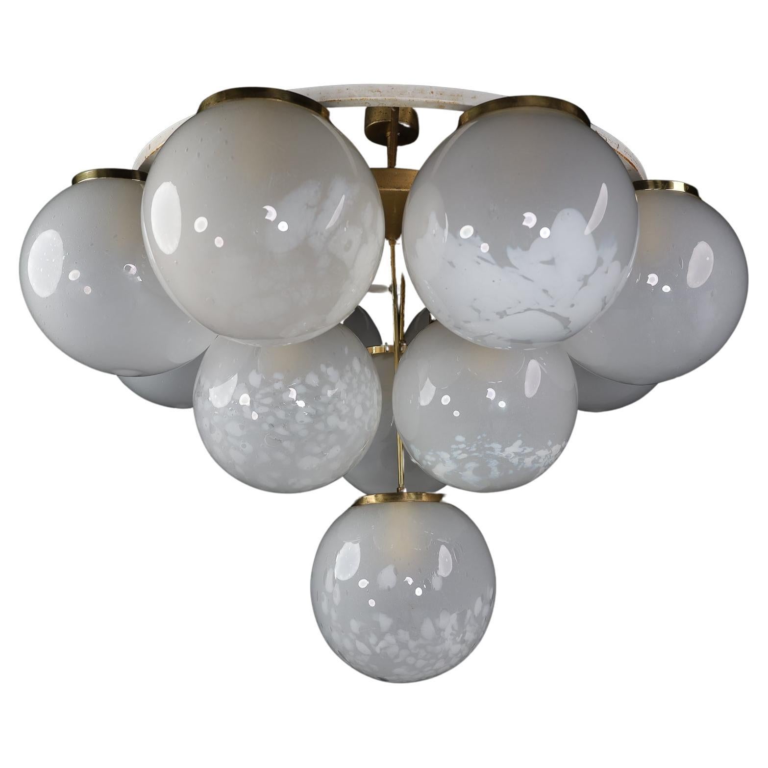 Mid-Century Modern chandelier/Flush Mount With Large frosted Globes, Italy 1960s

Flush mount - chandelier (diameter 110 cm) with hand-blowed frosted glass globes with brass details, produced and designed in Italy in the 1960s. 12 large hand-blew