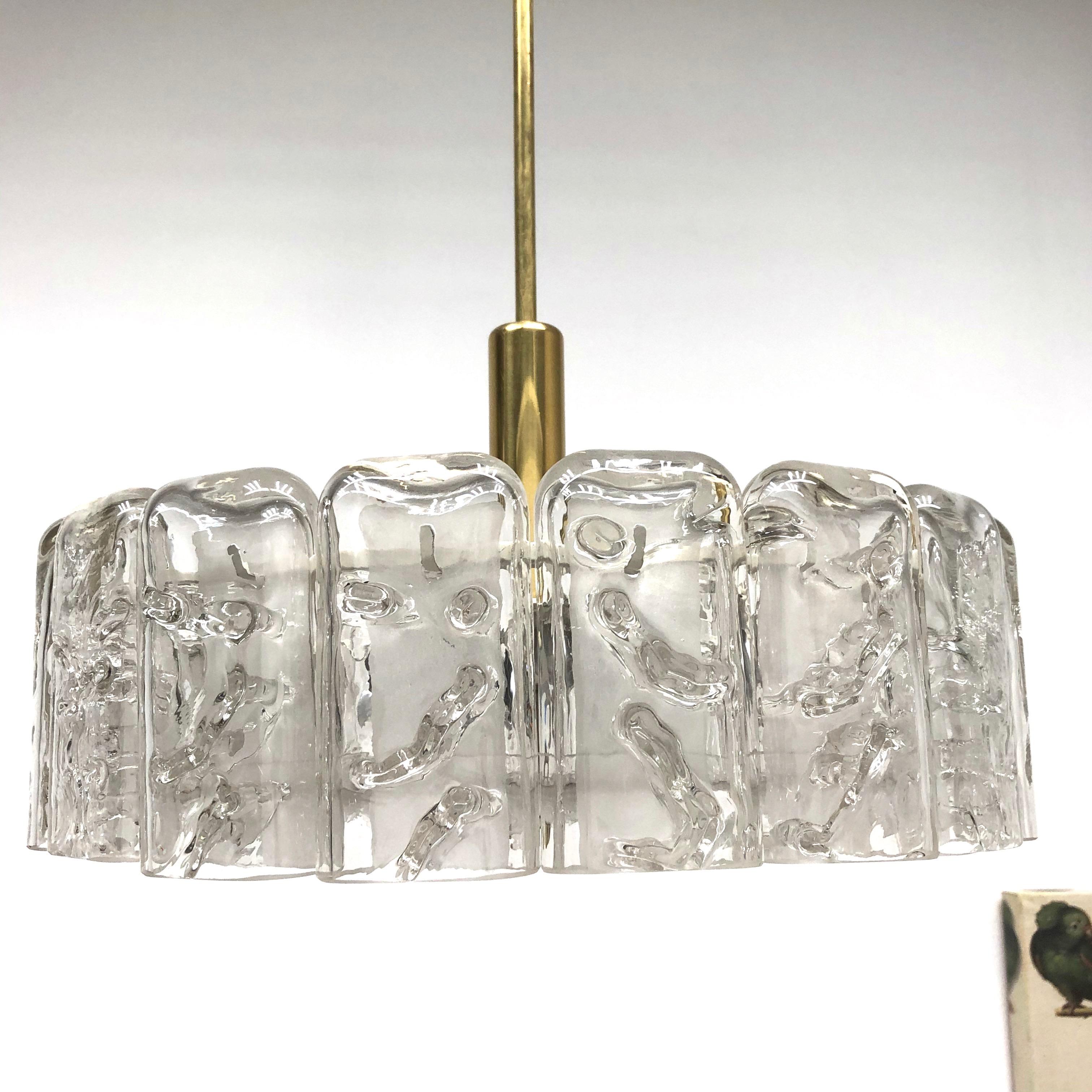 Gorgeous glass tube pendant light made by Doria Leuchten, Germany. It is in very good condition and requires six European E14 / 110 Volt candelabra bulbs, each bulb up to 40 watts. 