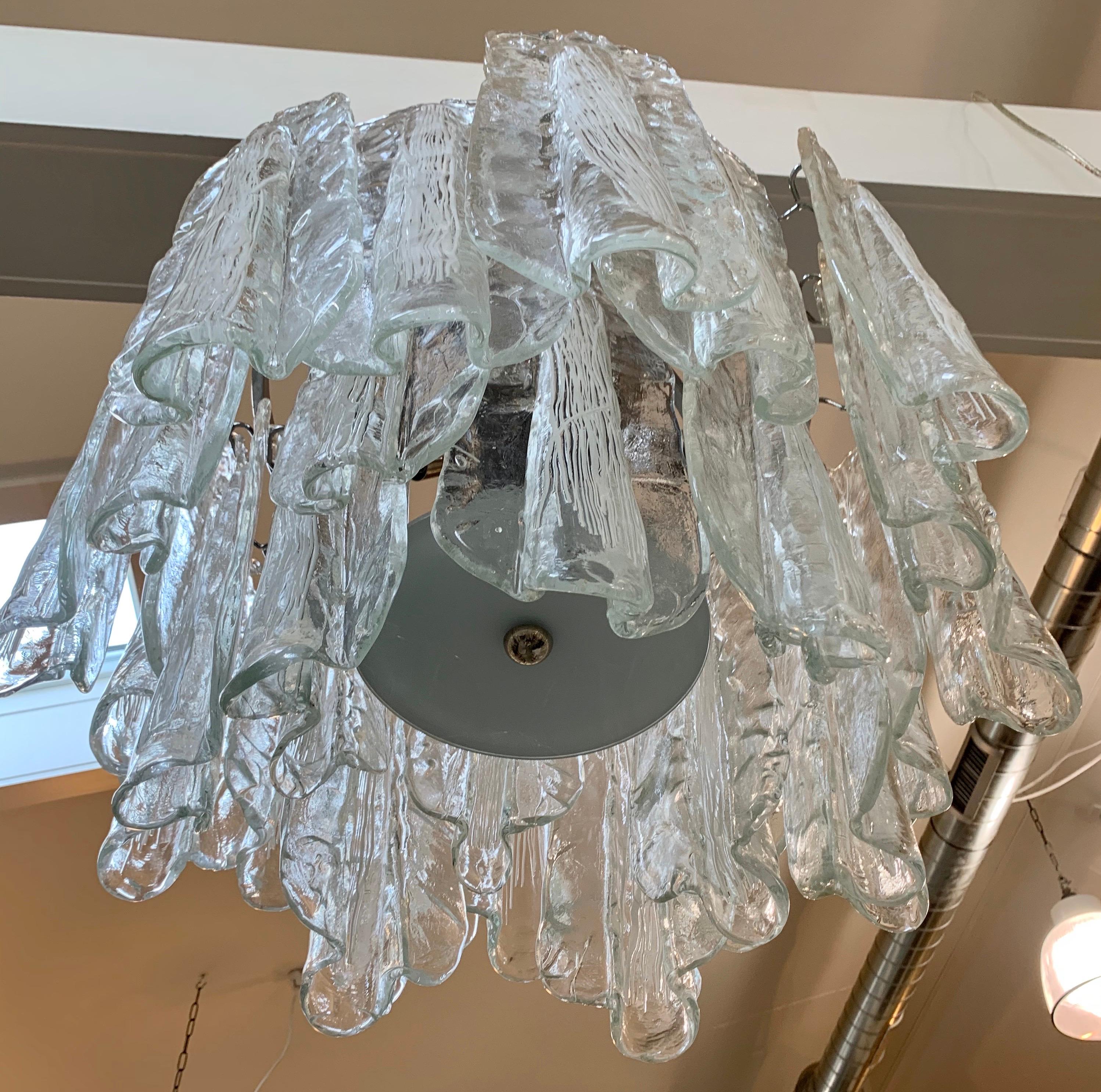 Iconic Italian Murano glass hanging slab chandelier. Great scale and style. Now, more than ever, home is where the heart is, circa 1970s. Wired for USA and in perfect working order.