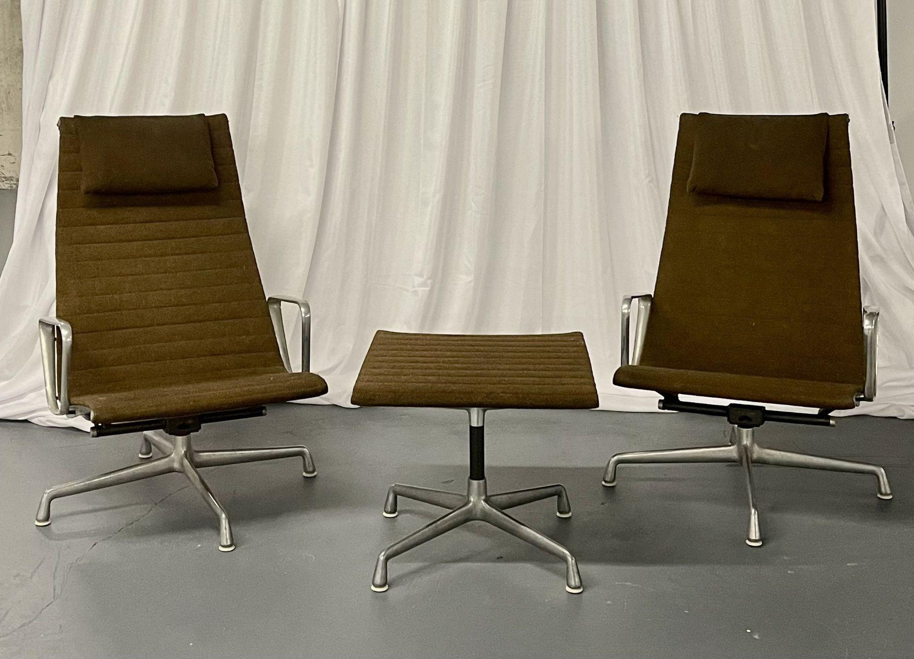 Mid-Century Modern Charles & Ray Eames swivel chairs, ottoman, seating group

Mid-Century Modern seating group having a pair of arm swivel chairs and a matching side table or ottoman. The swivel chairs are stamped 