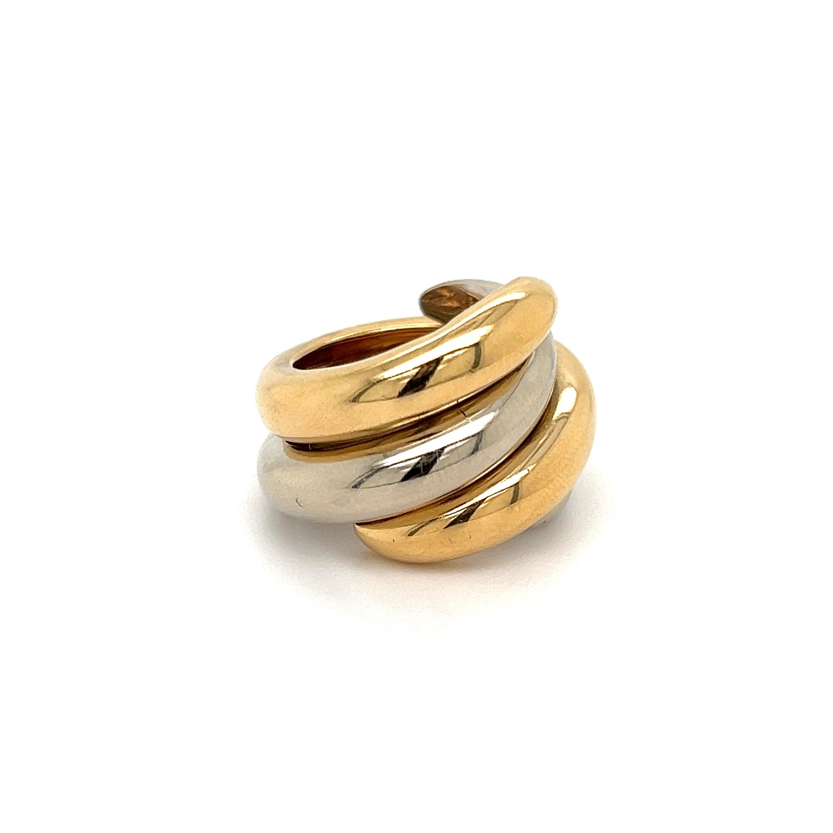 Simply Beautiful! Chaumet France Designer 18K 2-Tone Gold Band Ring. One Band Hand crafted in 18K Yellow Gold, the other Band in 18K White Gold. Measuring approx. 0.92” l x 0.91” w x 0.76” h. Ring size 5.5, we offer ring resizing. Circa 1960s. More