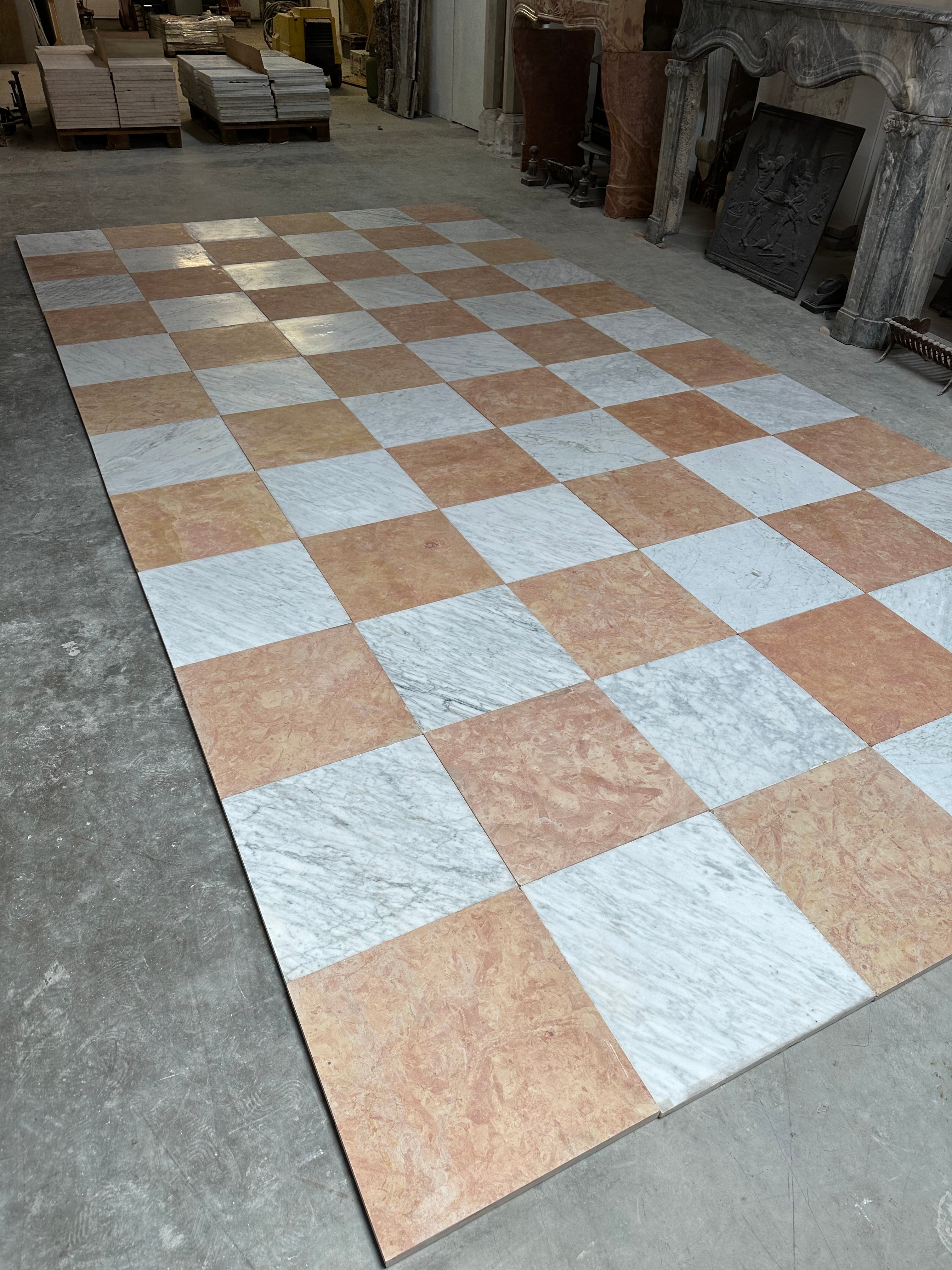 Amazing checkered Mid-Century Modern floor tiles.

Beautiful reclaimed floor from and amazing and famous design villa in the center of Holland.
The floor was carefully removed, cleaned and treated to get ready for its next life.

The vibrant