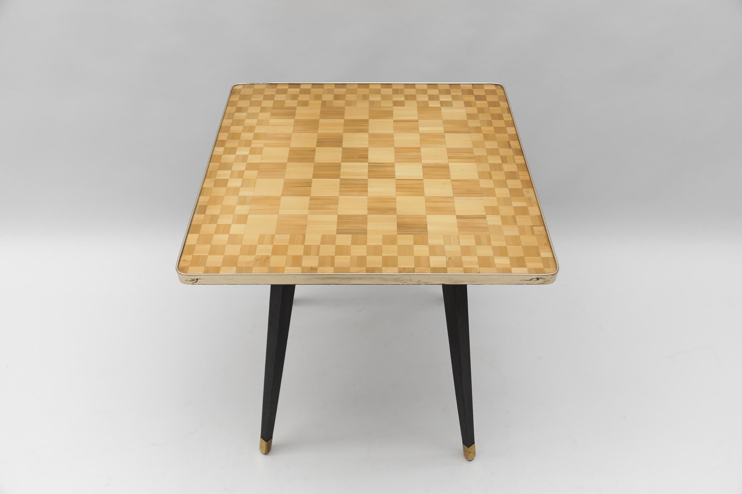 Mid-Century Modern Chess table, Italy, 1950s

One foot has a small brass plate on one side of the square cap and the edge has a few signs of wear.