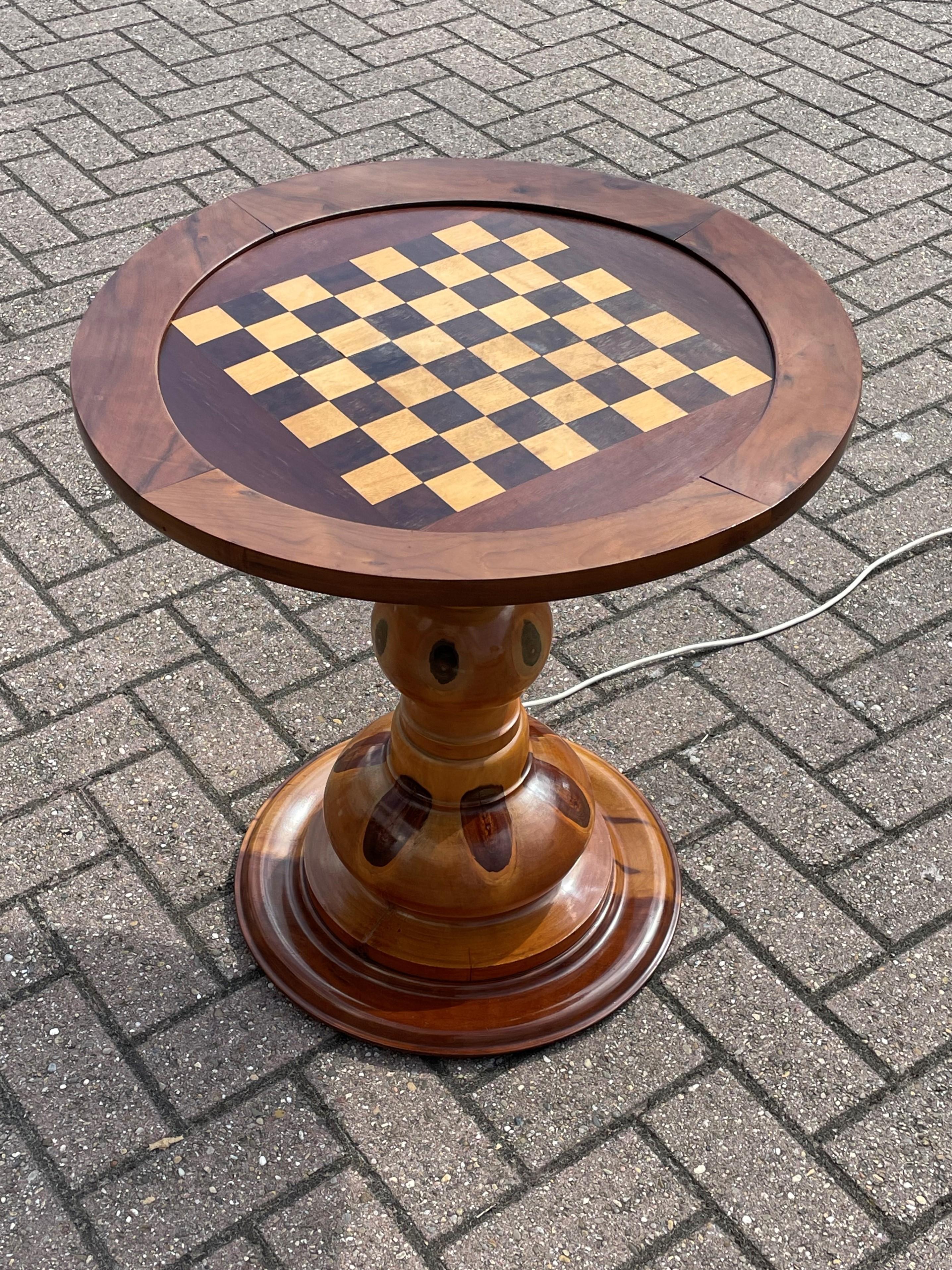 Rare design and great looking, handcrafted wooden chess table with unique natural patterns and colors.

This midcentury era chess table (with built-in lamp in the base) has some of the most beautiful, natural colors ever. We don't know what type of