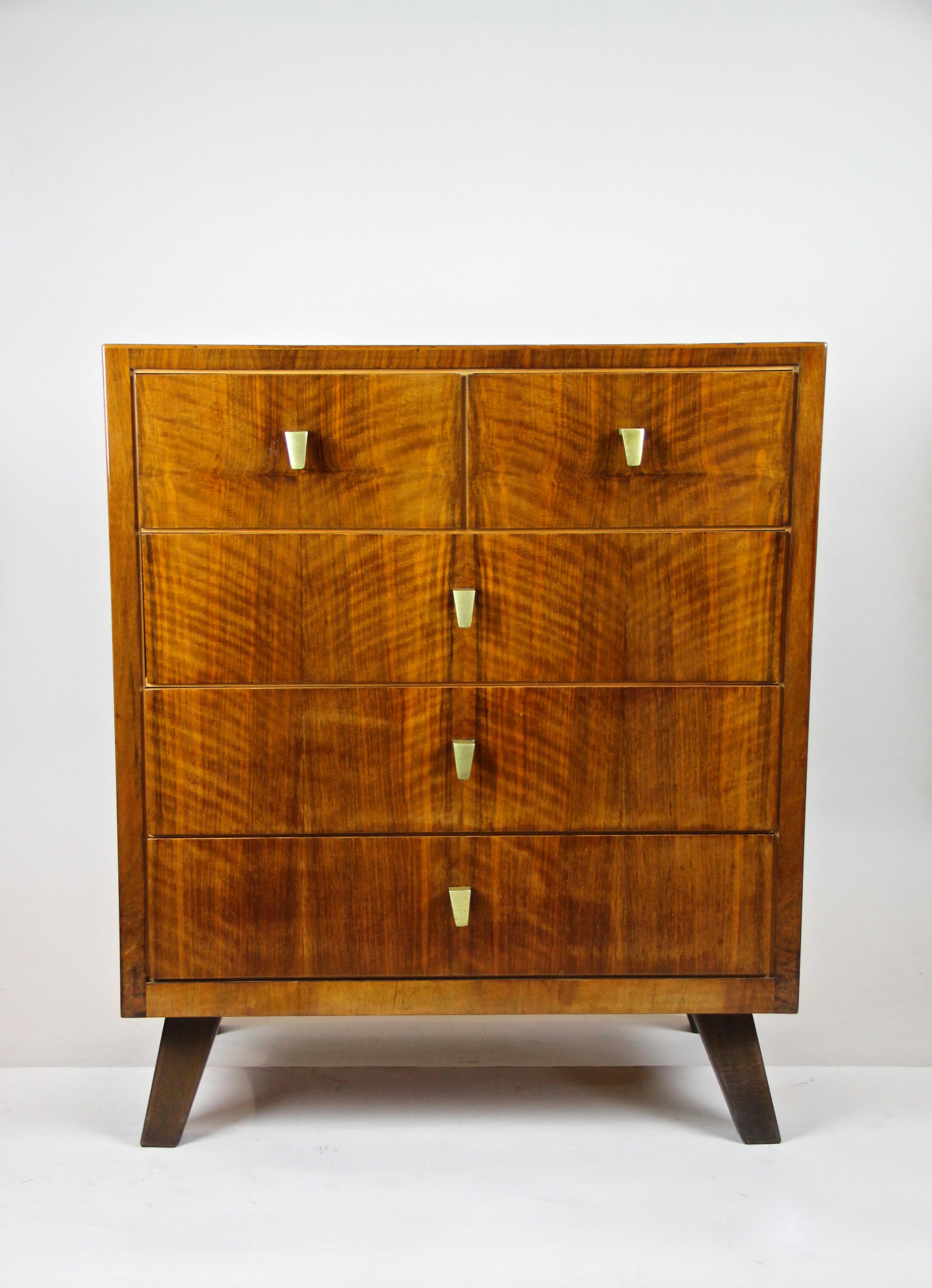 Unique Mid-Century Modern chest of drawers or commode from the 1960s in Austria. This exceptional, in a client´s order made chest of drawers was processed by an Austrian master carpenter and impresses with absolute timeless design. Made with highest