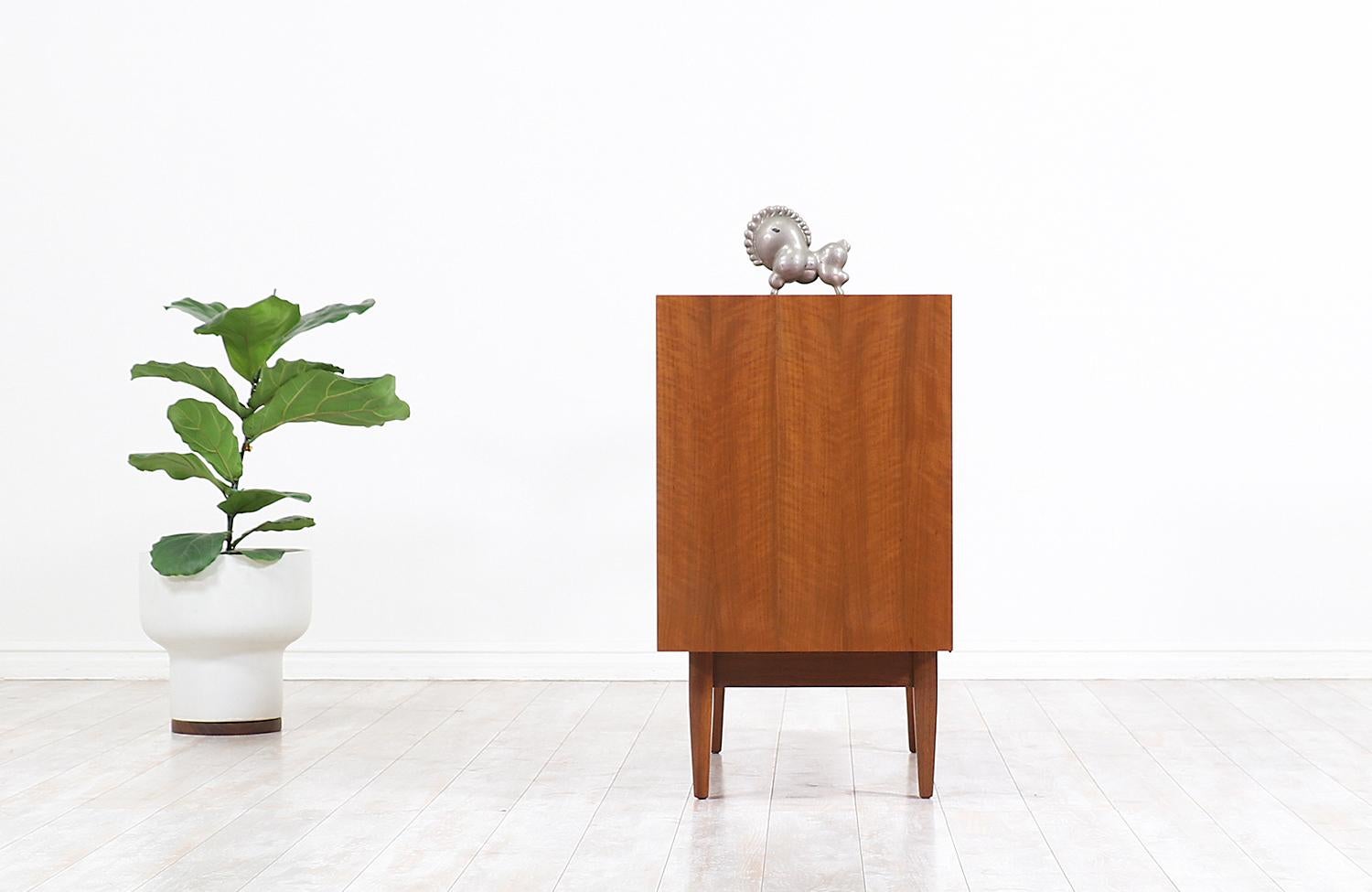 Mid-20th Century Mid-Century Modern Chest with Lacquered Bowtie Style Drawers