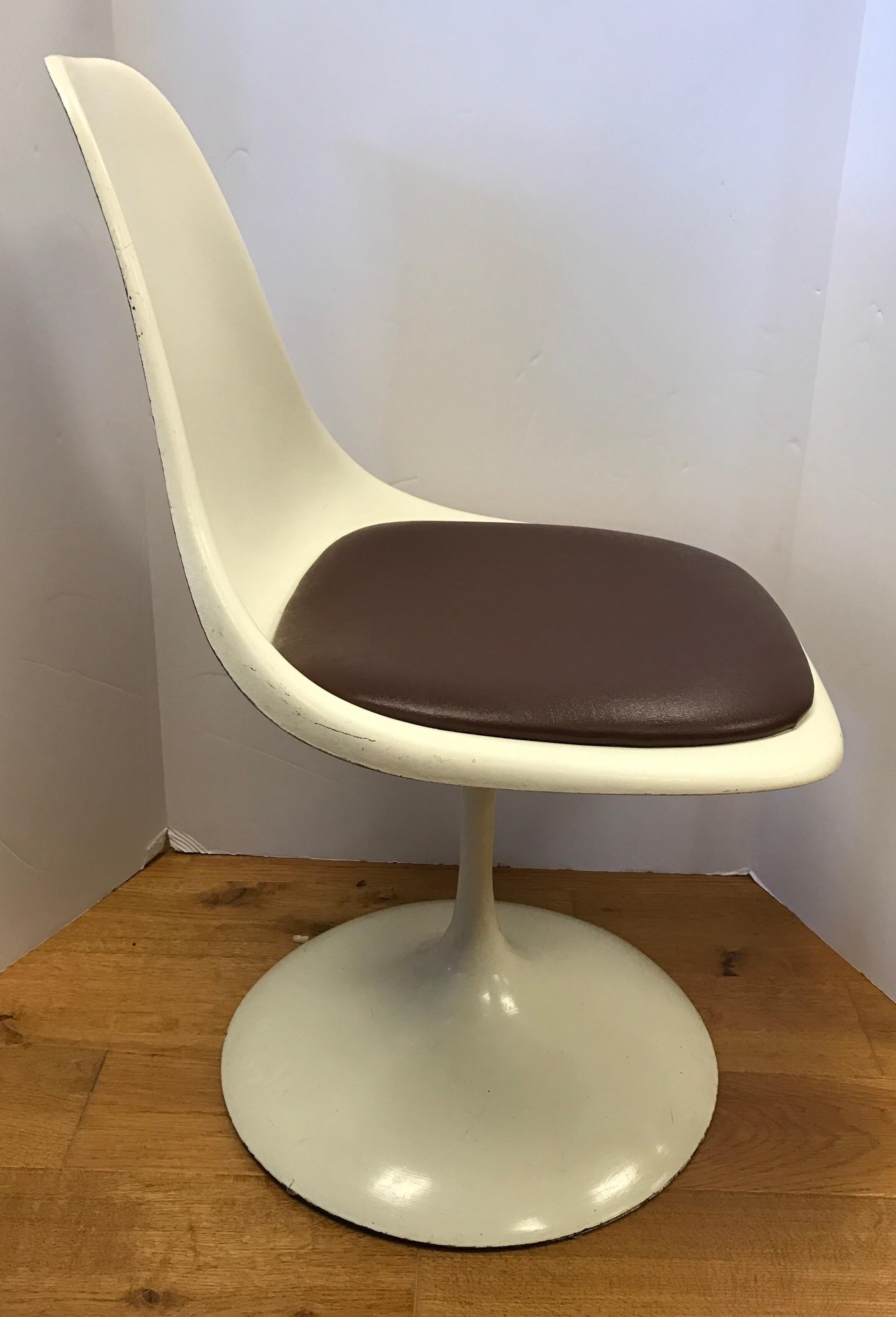 Rare set of white tulip dining chairs with semi gloss finish and brown vinyl seat. What makes them rare is the scale, they are kids size.