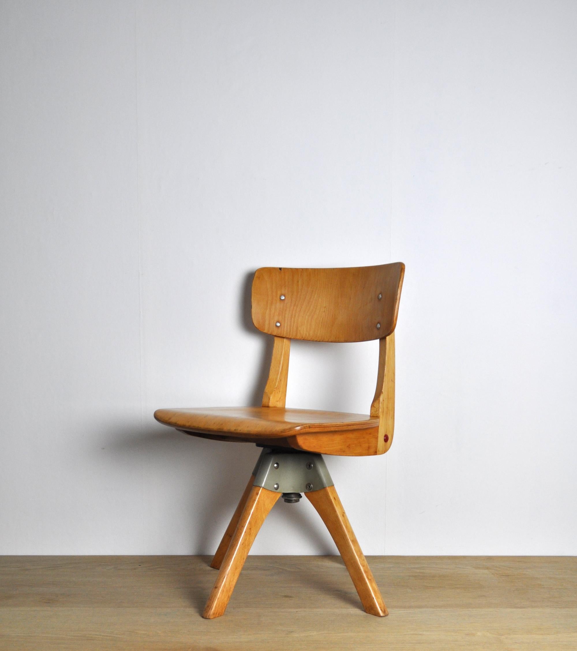 Patinated Casala wood childrens swivel chair, Germany 1970s.
Solid craftsmanship and comfortable chair. 
Good patinated vintage condition.