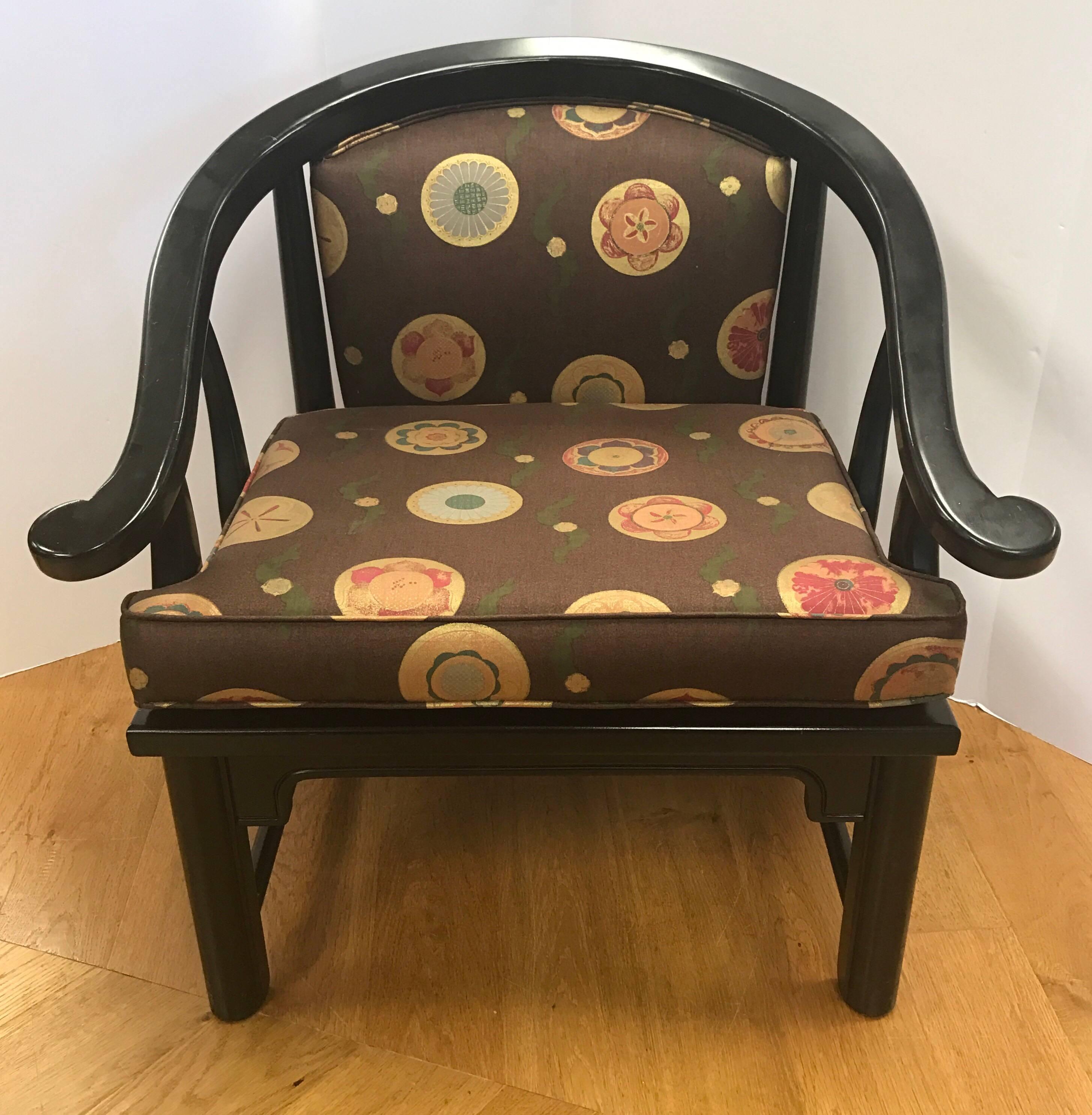 Classic James Mont style black mid century horseshoe chairs. Seat fabric is geometric and gorgeous.