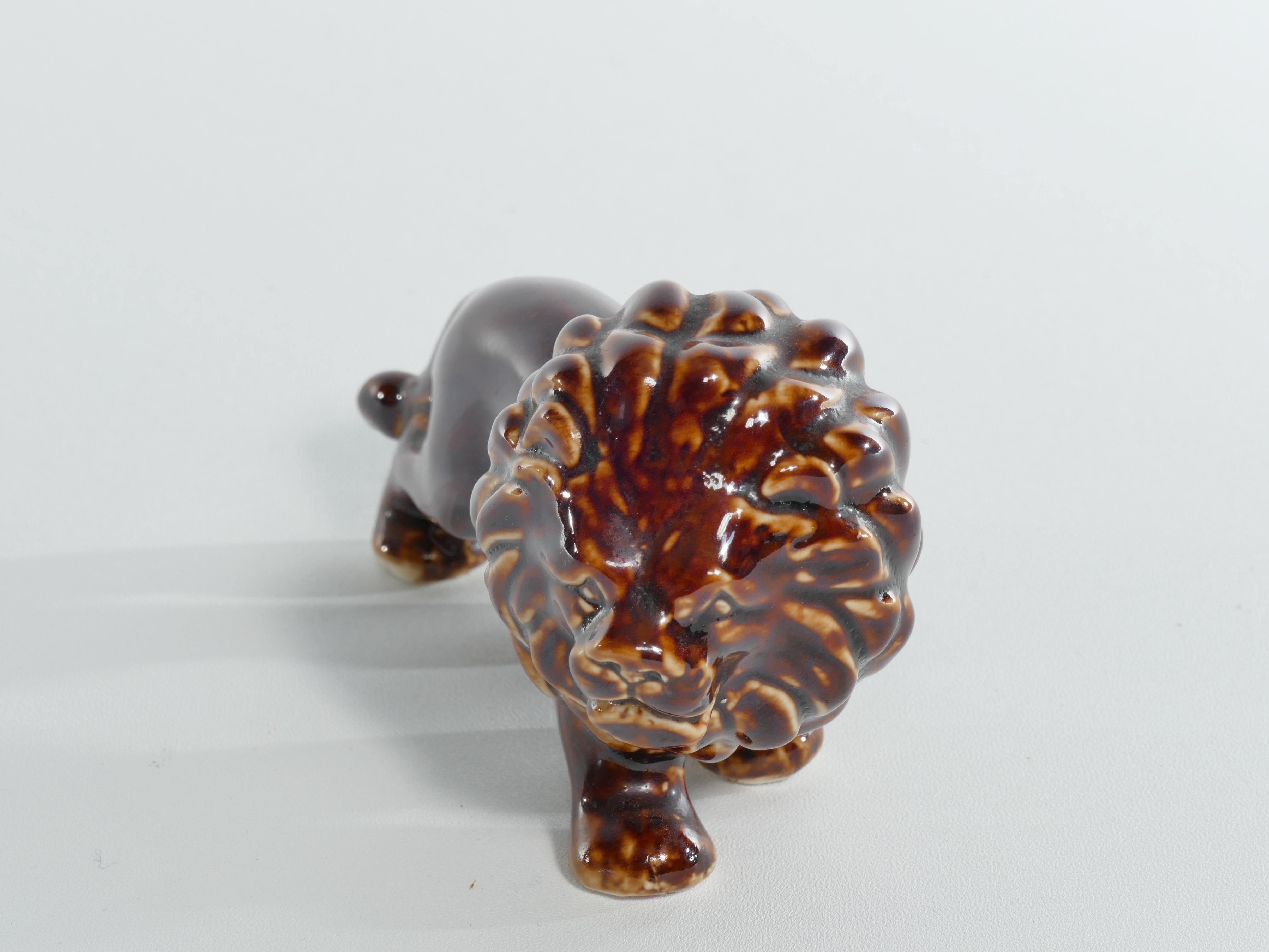 Porcelain Mid-Century Modern Chinese Brown Glazed Lion Figurine For Sale