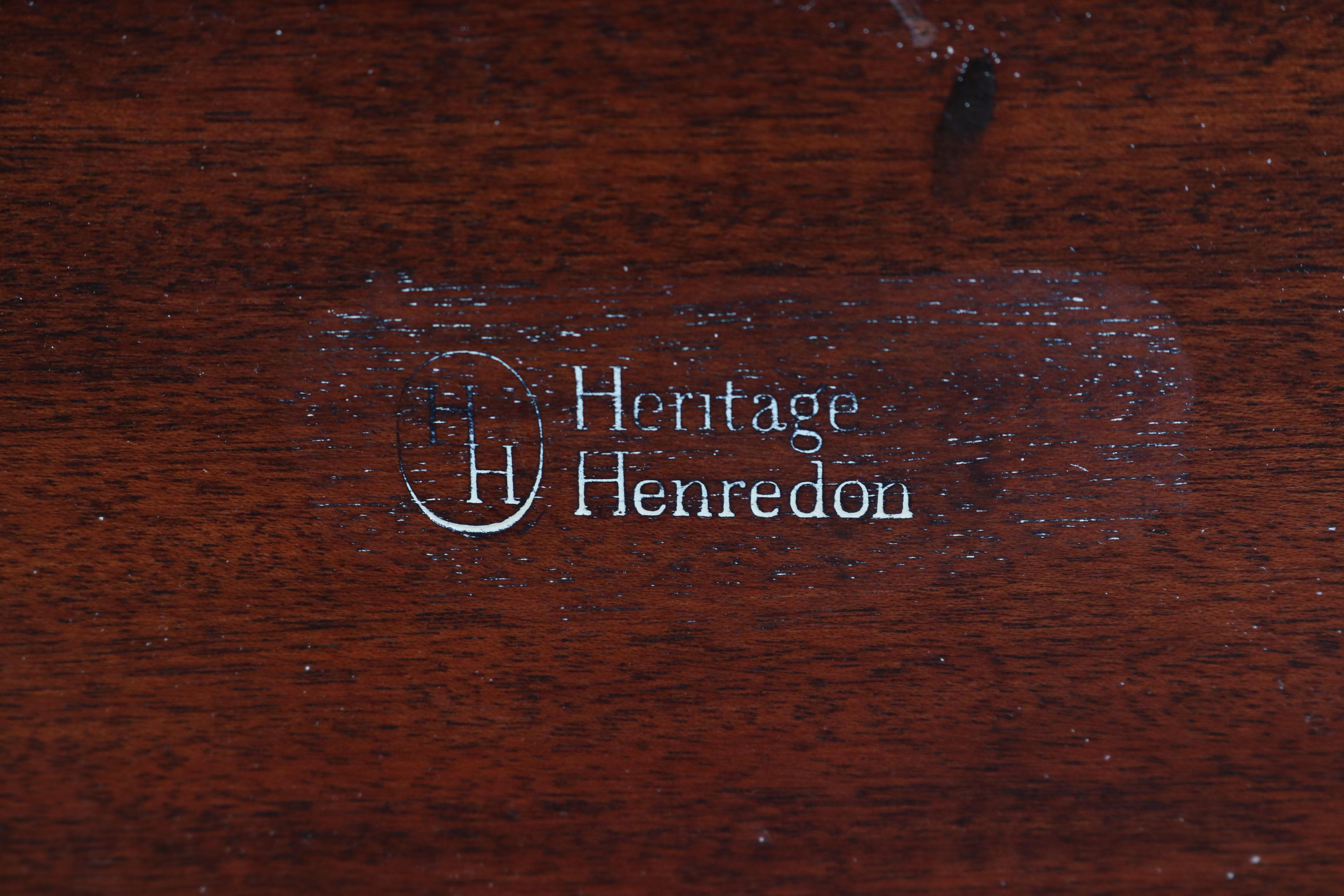 Mid-Century Modern Chinese styled mahogany coffee or cocktail table by Heritage Henredon features segmented flame mahogany top with pierced apron, 20th century

***DELIVERY NOTICE – Due to COVID-19 we are employing NO-CONTACT PRACTICES in the