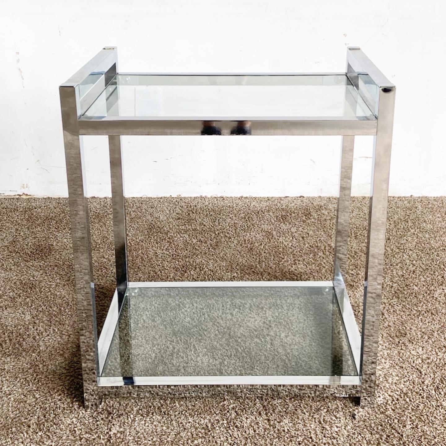Experience mid-century charm with our Modern Chrome 2 Tier Side Table, blending sleek sophistication with functionality for a stylish addition to any space.

Features a sturdy chrome frame reflecting the minimalist aesthetic of the mid-century