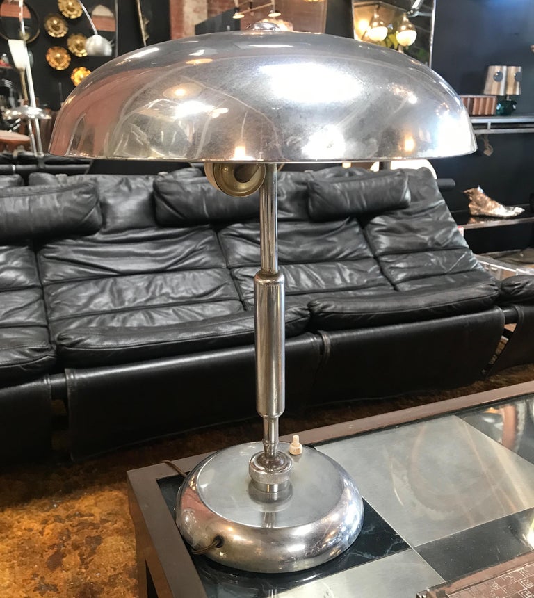 Mid-Century Modern chrome adjustable desk light, Italy, 1960s
Very sculptural yet practical. Base diameter is 7 inches, the dome shade itself is 12 inches wide.