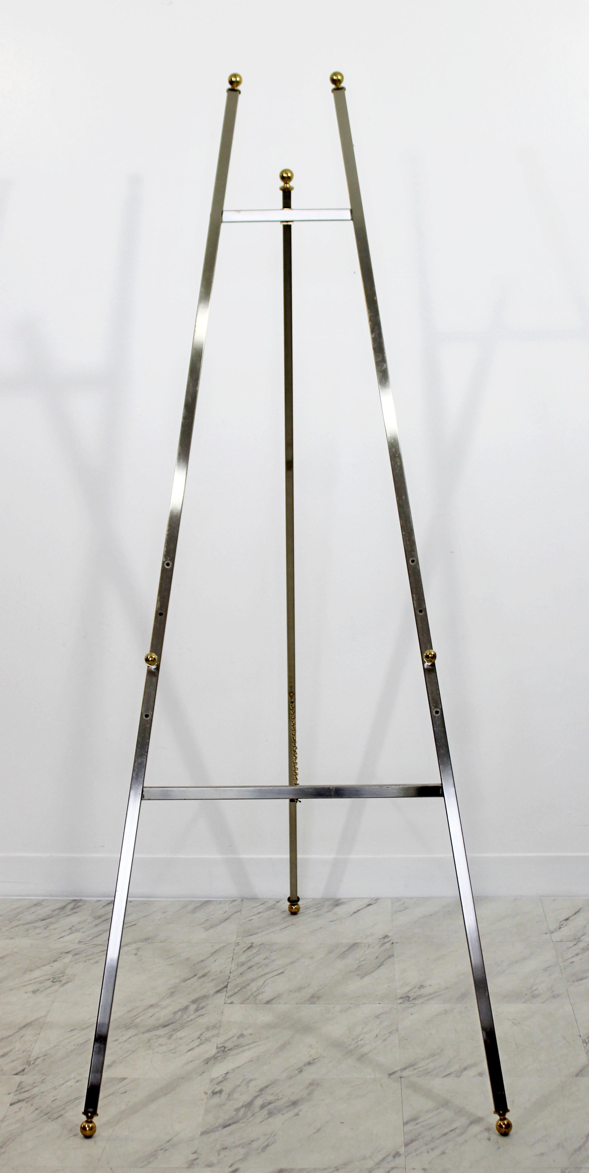 For your consideration is a tall, chrome and brass accented, art display easel, made in Italy, circa 1970s. In very good condition. The dimensions are 25
