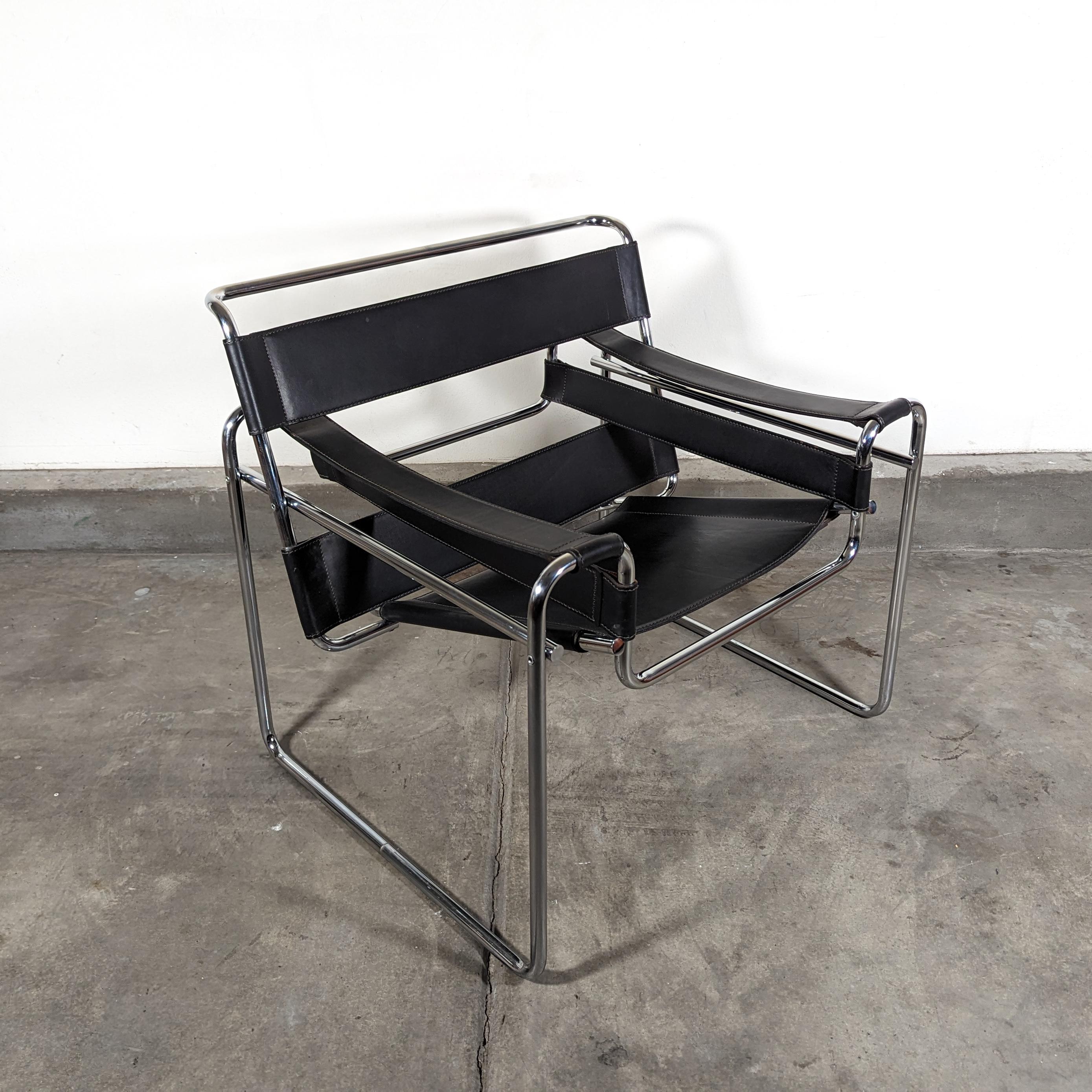 Step back in time with this stunning vintage mid century modern 'Wassily' lounge chair, a classic piece by Marcel Breuer. This iconic design, steeped in history, is a true testament to the innovative style that mid century modern enthusiasts