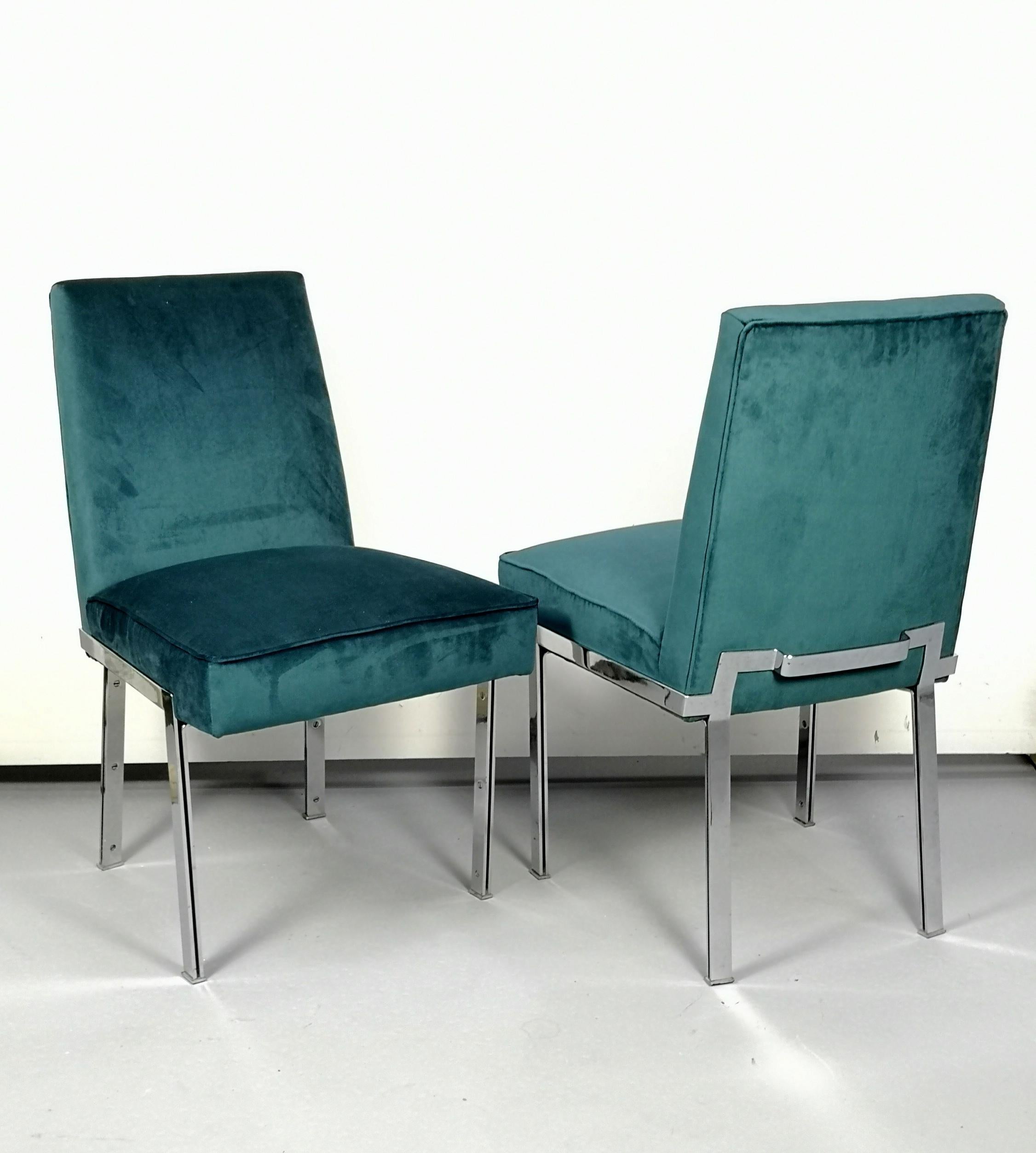 Fully re-upholstered with a turquoise high quality velvet, these heavy, chrome-plated steel chairs are of excellent design.