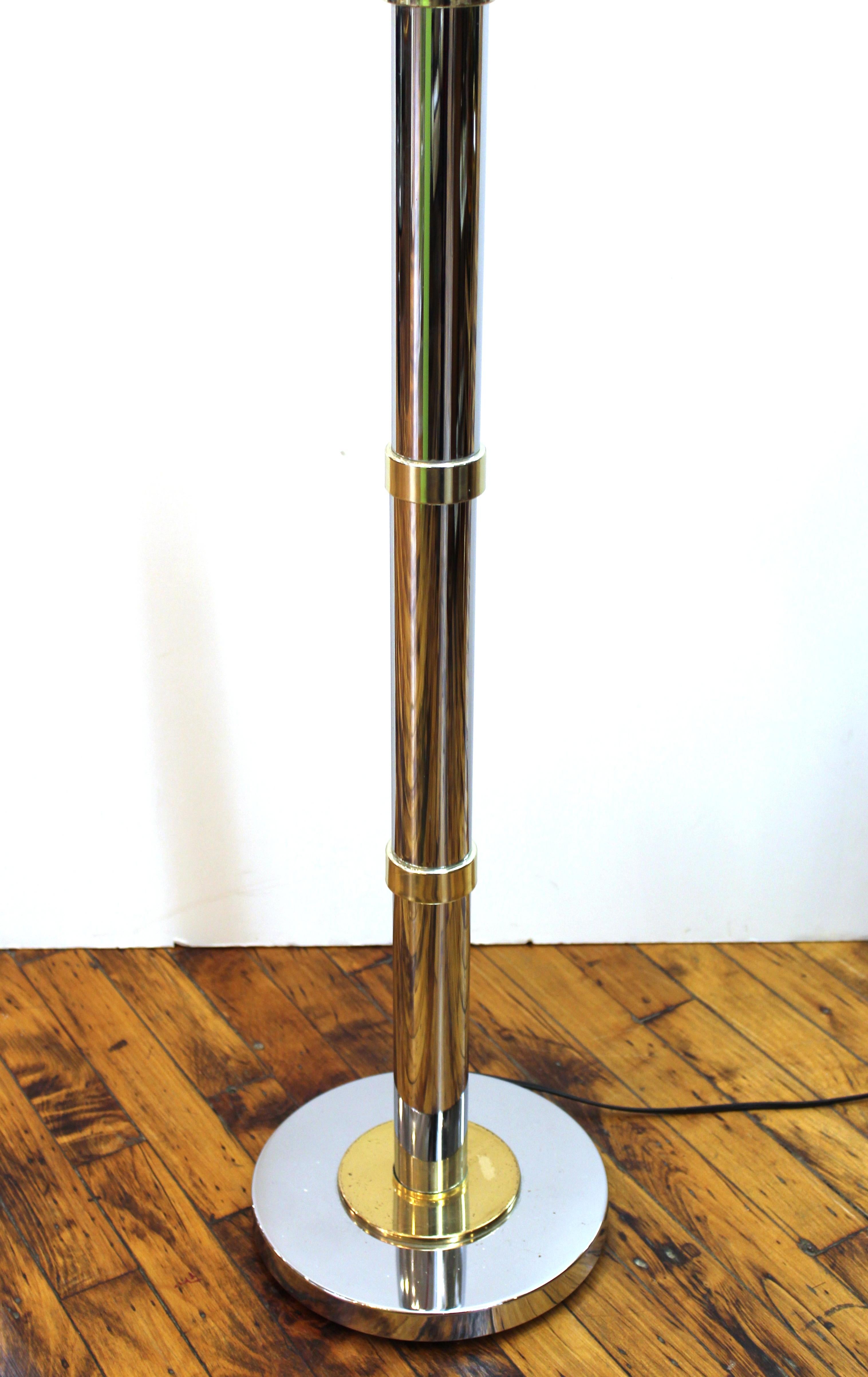 Mid-Century Modern chrome and brass banded floor lamp with fabric shade, made in the 1970s in the united states. Unmarked with wear consistent with age and use.