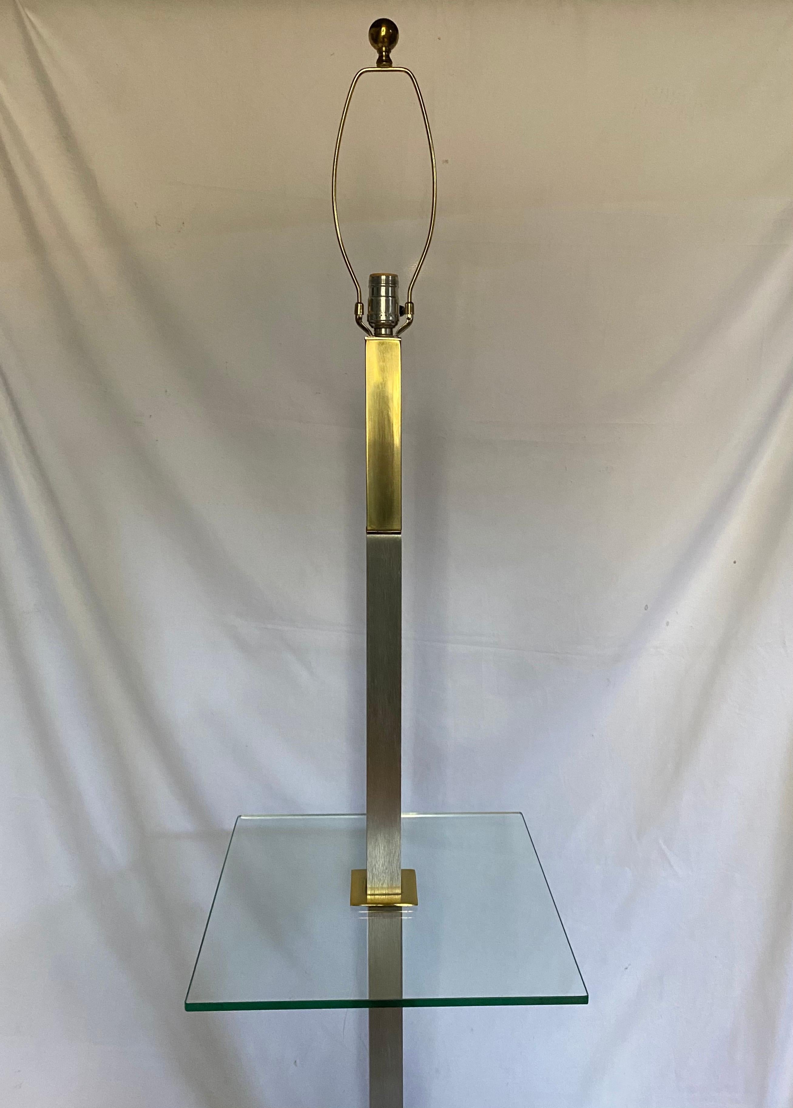 brass floor lamp with glass table