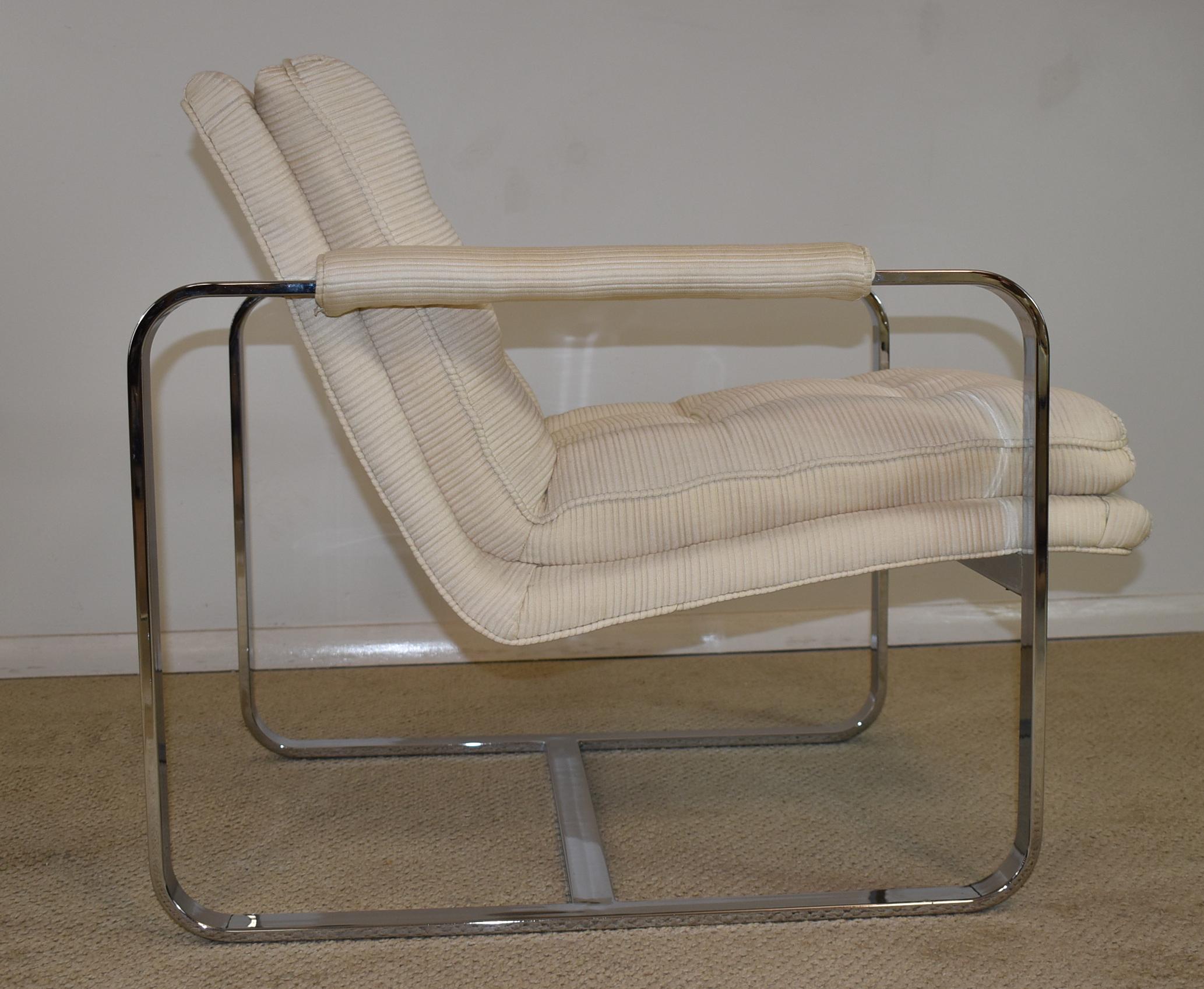 Mid-Century Modern chrome framed upholstered chair in the style of Milo Baughman. Off-white fabric in very nice condition with some minor stains. Dimensions: 34