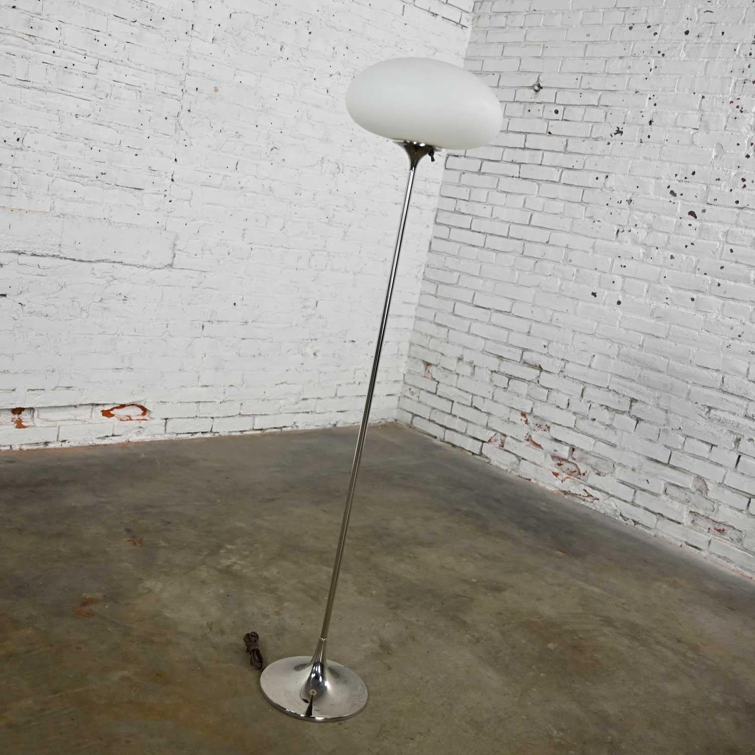 Lovely Mid-Century Modern chrome floor lamp with frosted glass mushroom globe by Laurel Lamp Company. Beautiful condition, keeping in mind that this is vintage and not new so will have signs of use and wear. There is nothing outstanding, but you